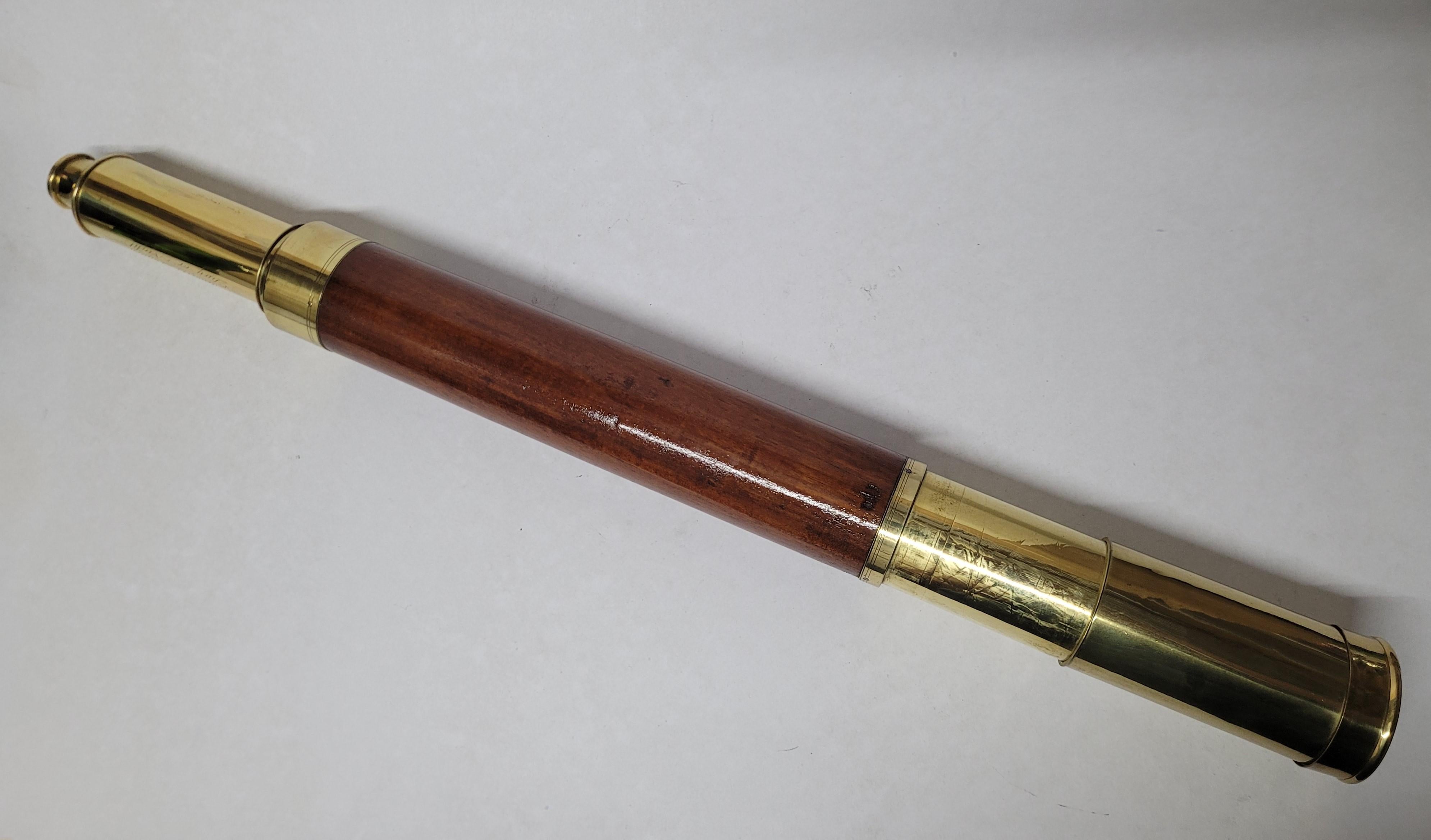 Ships spyglass telescope appropriate for use on a yacht, ship, or anywhere with a view. This has been meticulously polished and lacquered. We just restored a great collection of these. This fine instrument has a single draw varnished wood barrel of
