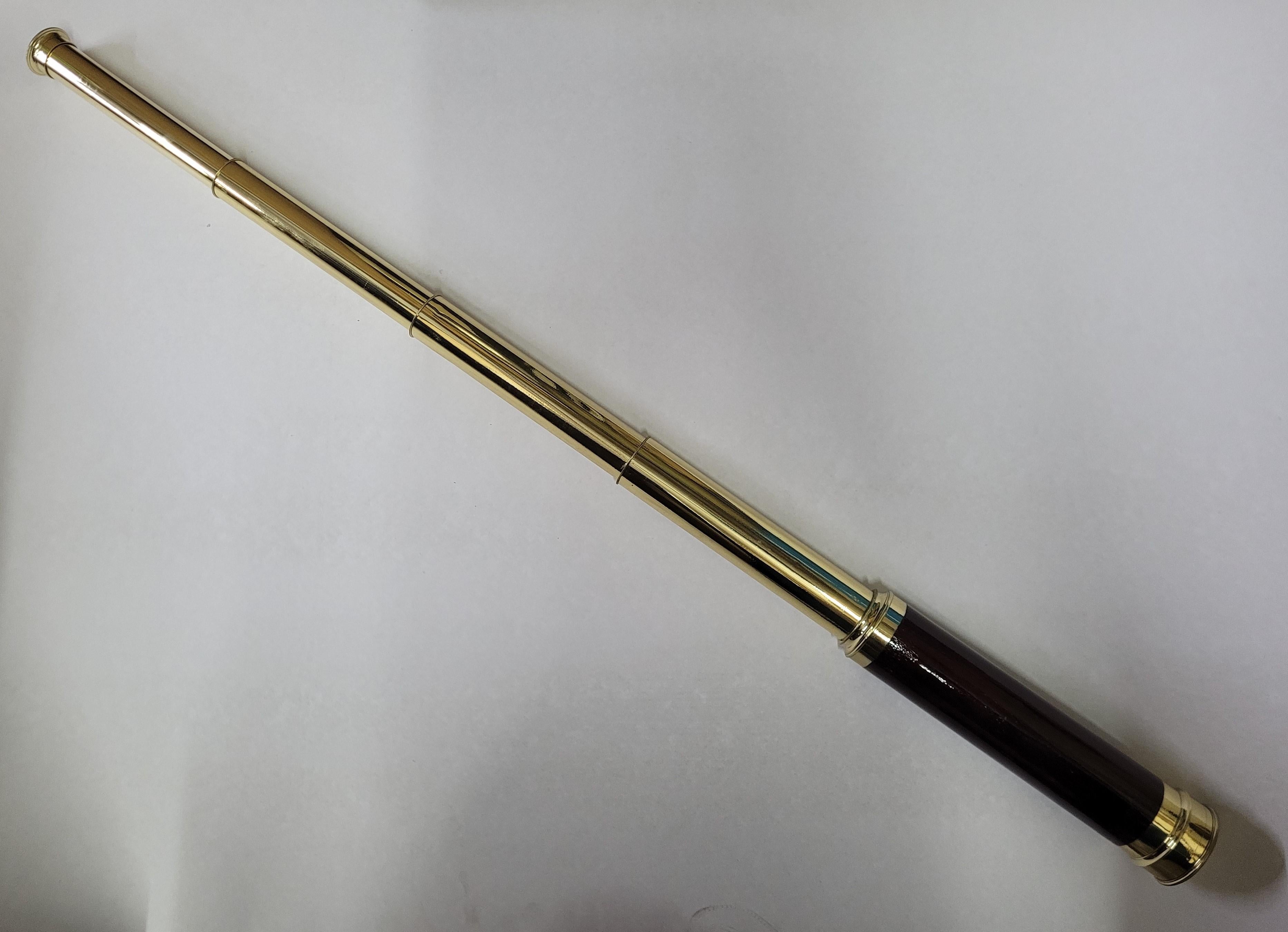 Ships spyglass telescope appropriate for use on a yacht, ship, or anywhere with a view. This has been meticulously polished and lacquered. We just restored a great collection of these. This fine instrument has a four draw barrel. The focal tube has