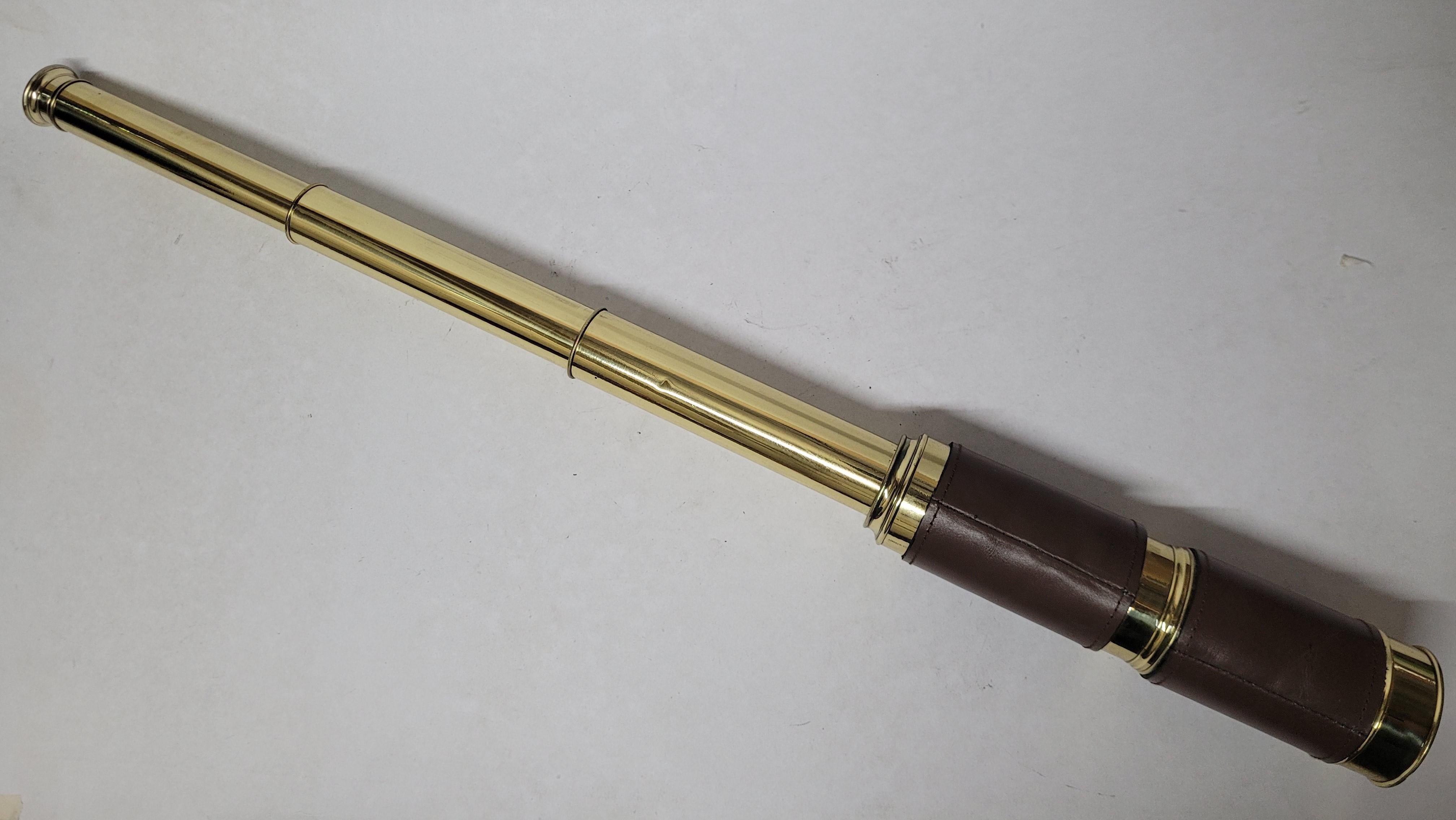 Ships spyglass telescope appropriate for use on a yacht, ship, or anywhere with a view. This has been meticulously polished and lacquered. We just restored a great collection of these. This fine instrument has a triple draw barrel of solid brass