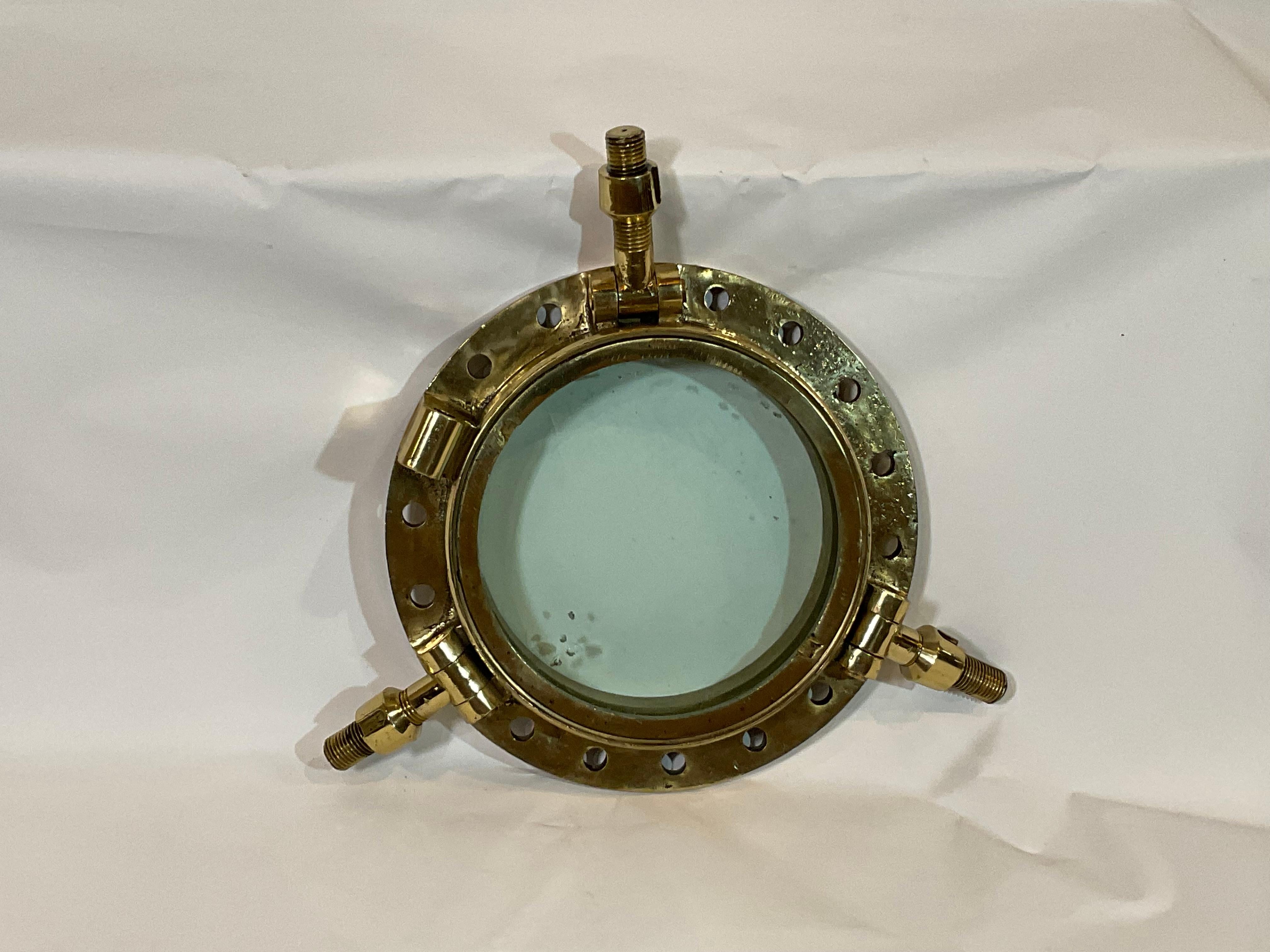 antique brass porthole