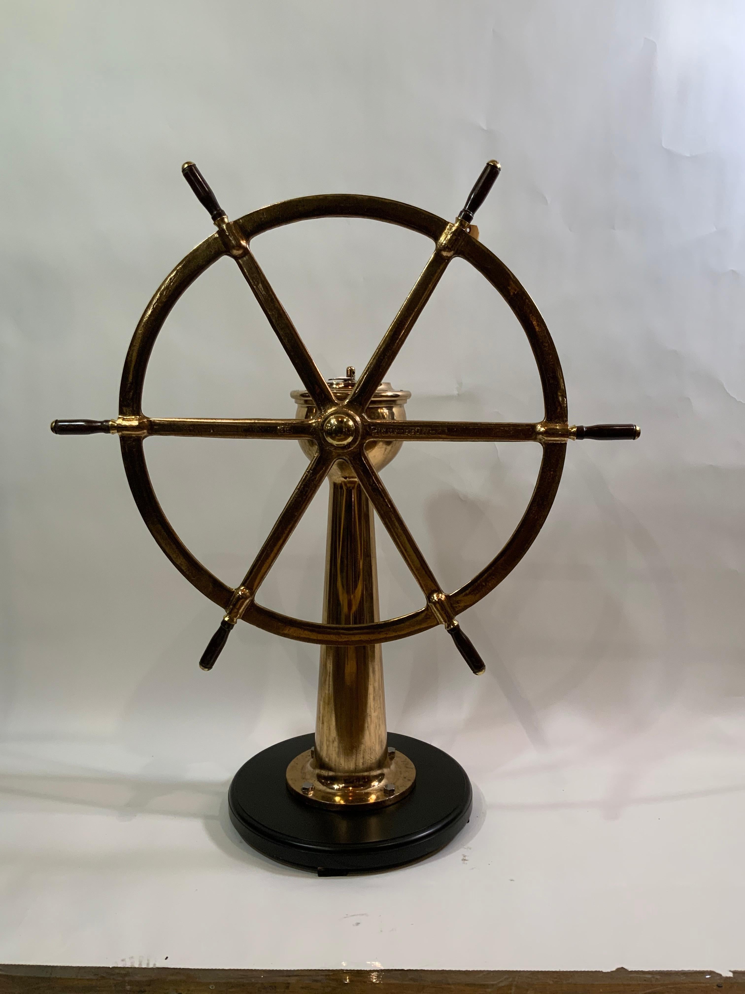 Solid Brass Ships Wheel Mounted Onto A Substantial Brass Pedestal In Excellent Condition In Norwell, MA