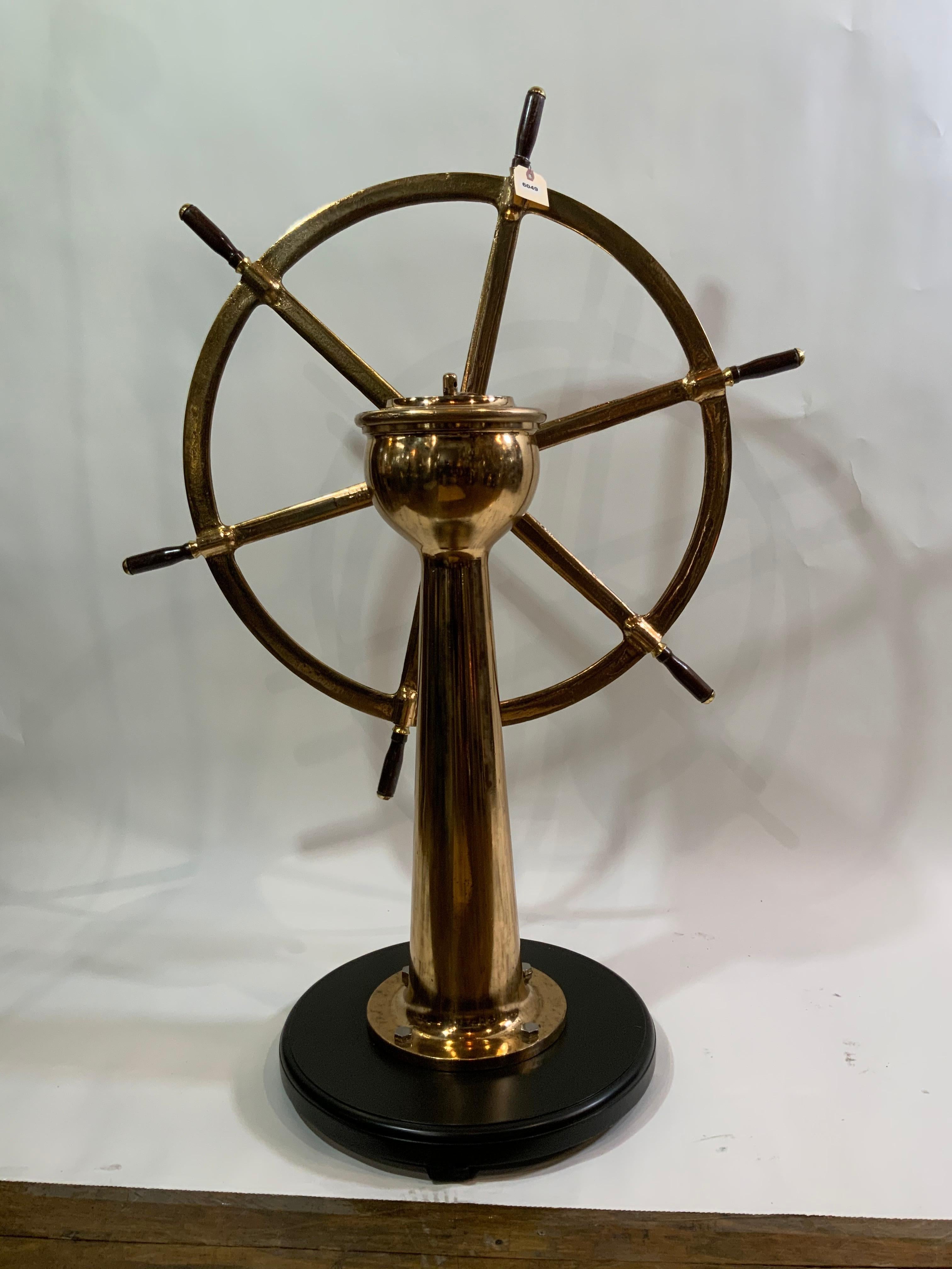 20th Century Solid Brass Ships Wheel Mounted Onto A Substantial Brass Pedestal