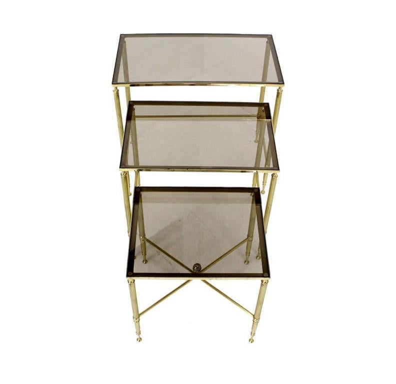Set of three mid century modern solid brass stacking end tables.