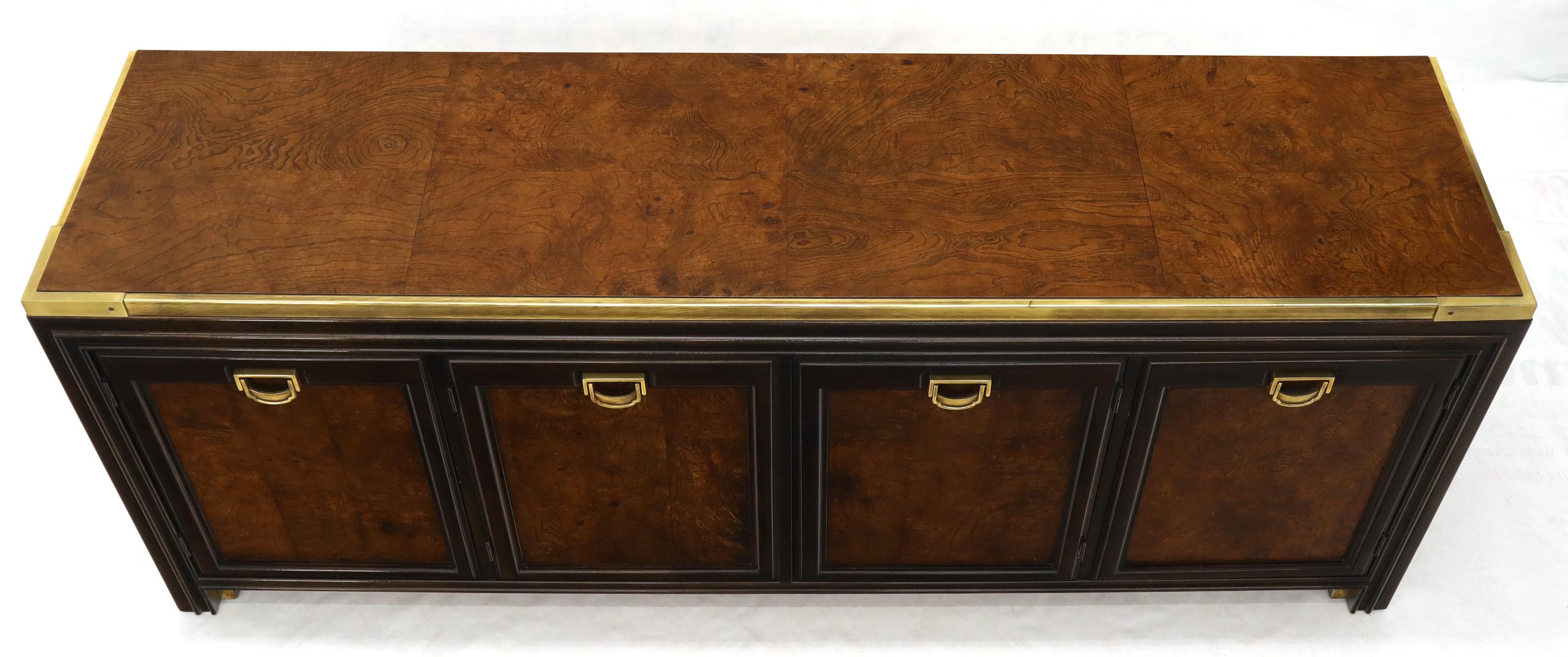 Mid-Century Modern brass trim burl wood 4 doors credenza with three drawers in style of Mastercraft. Unmarked. Near mint condition.