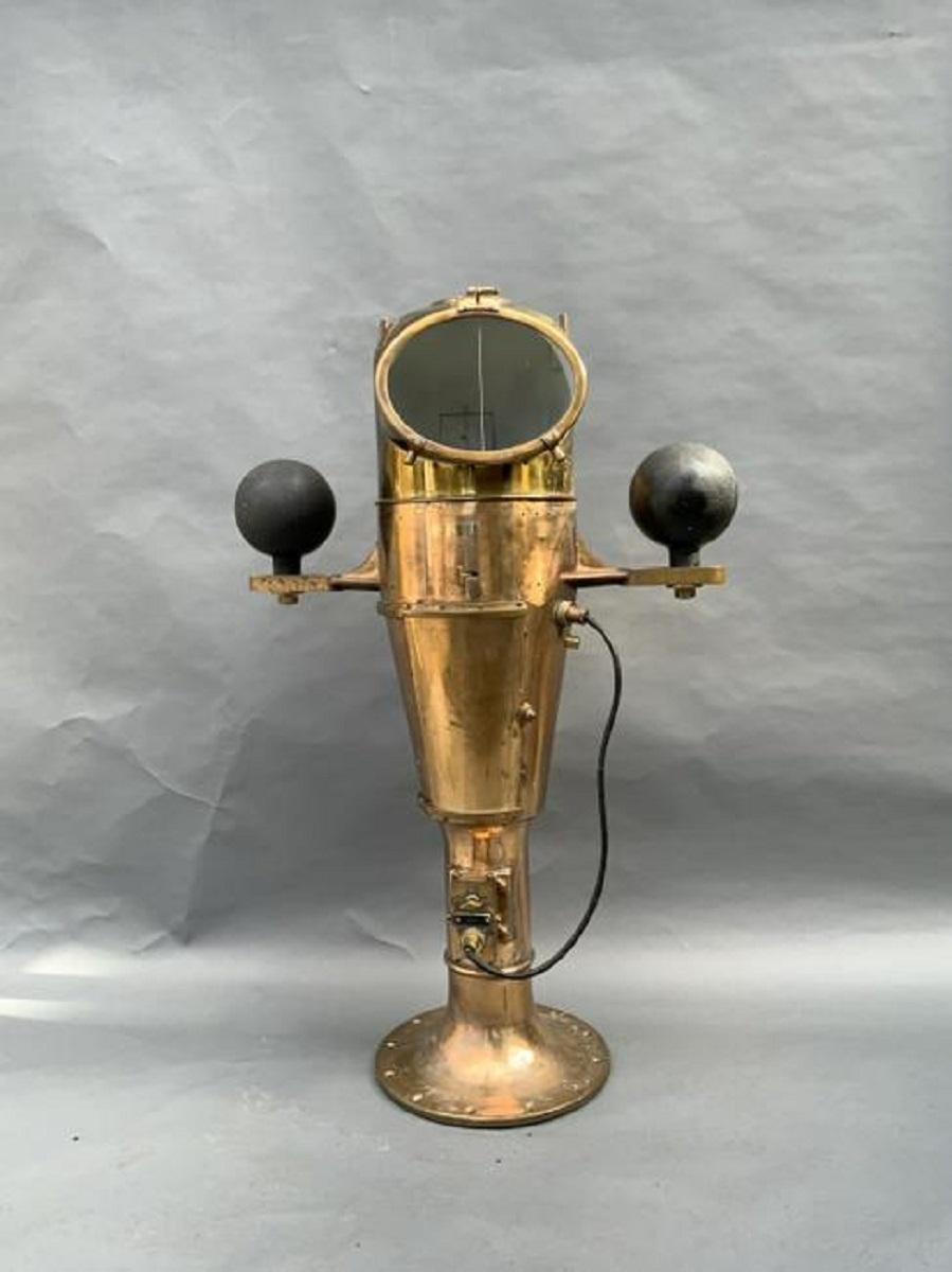 Solid brass battleship binnacle with gimballed compass. Iron compensating balls are mounted to brackets. Quite heavy. from the US Navy. Torpedo base. Great polish job.

Overall dimensions: Weight is 271 pounds. 53