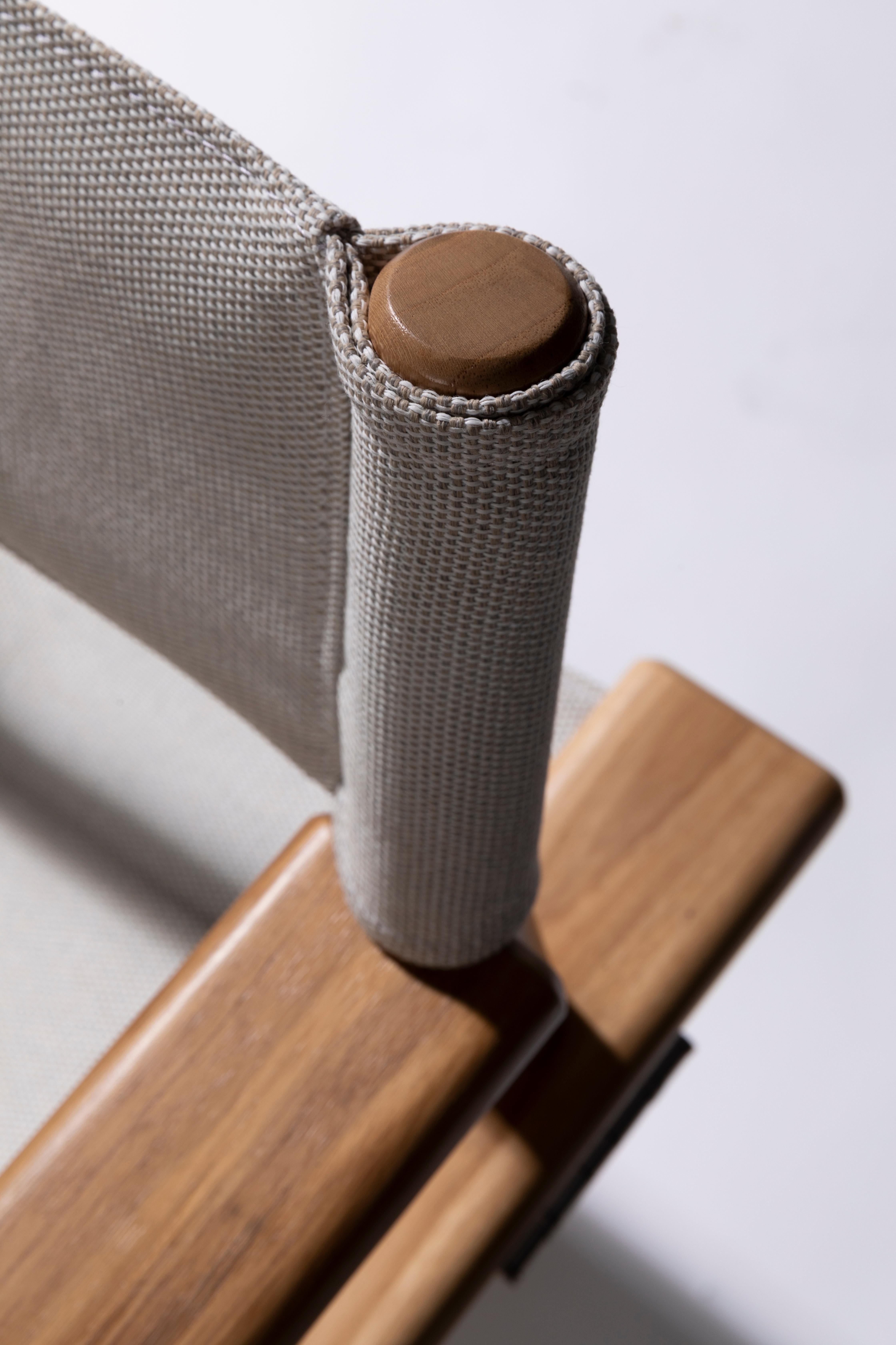 The Glauber Chair by Adalfan Filho for +55design reimagines the iconic director’s chair through the lens of Brazilian craft and cultural identity. Inspired by legendary filmmaker Glauber Rocha, the design blends cinematic symbolism with artisanal