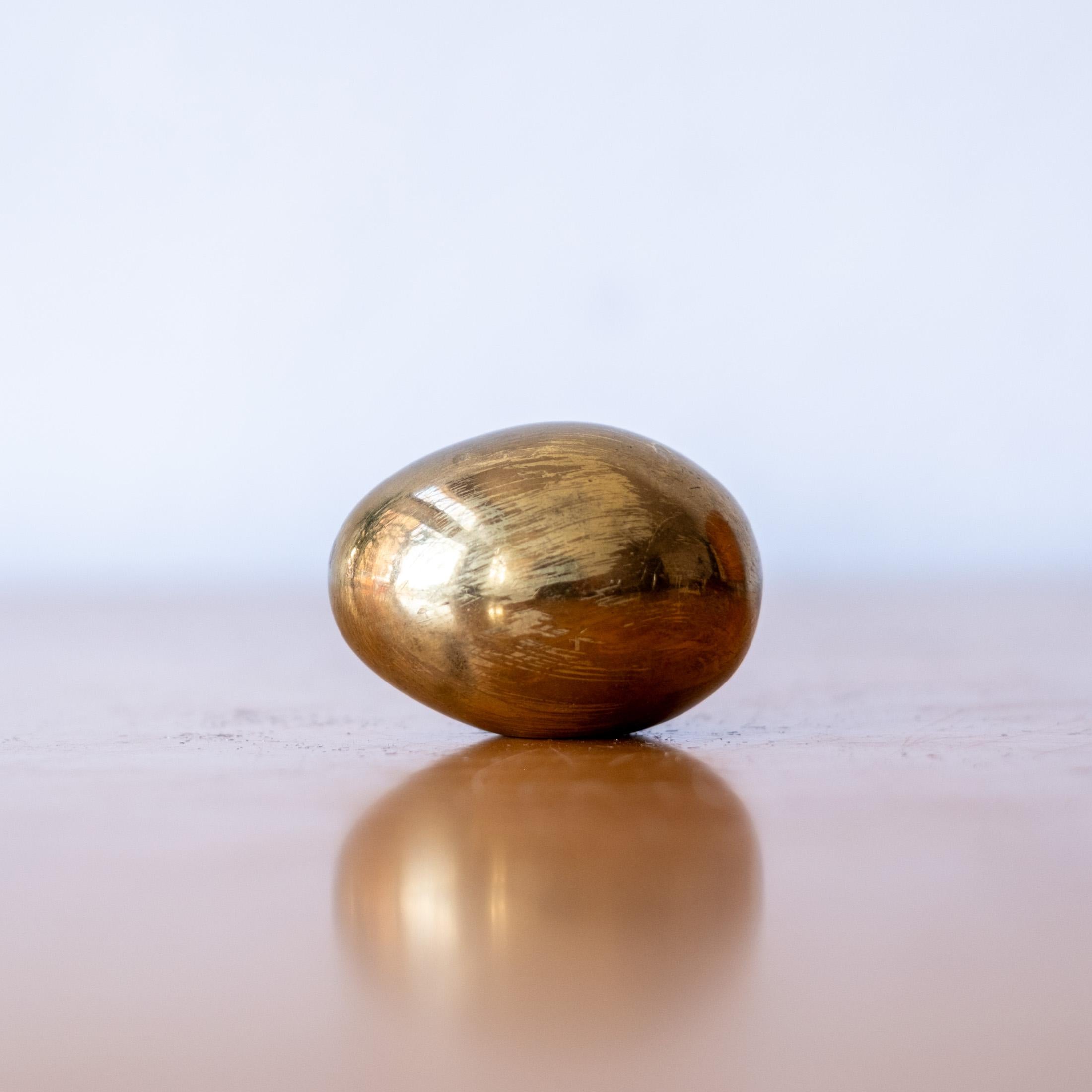 Solid bronze egg paperweight by Carl Aubock. Signed. Austria. 1960s. 