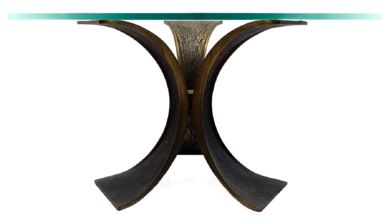 This solid bronze cocktail table was perhaps the inspiration for the Juan table designed by Luciano Frigerio in 1968. Most likely made in Italy or Spain.

A few important notes about all items available through this 1stdibs dealer:

1. We list all