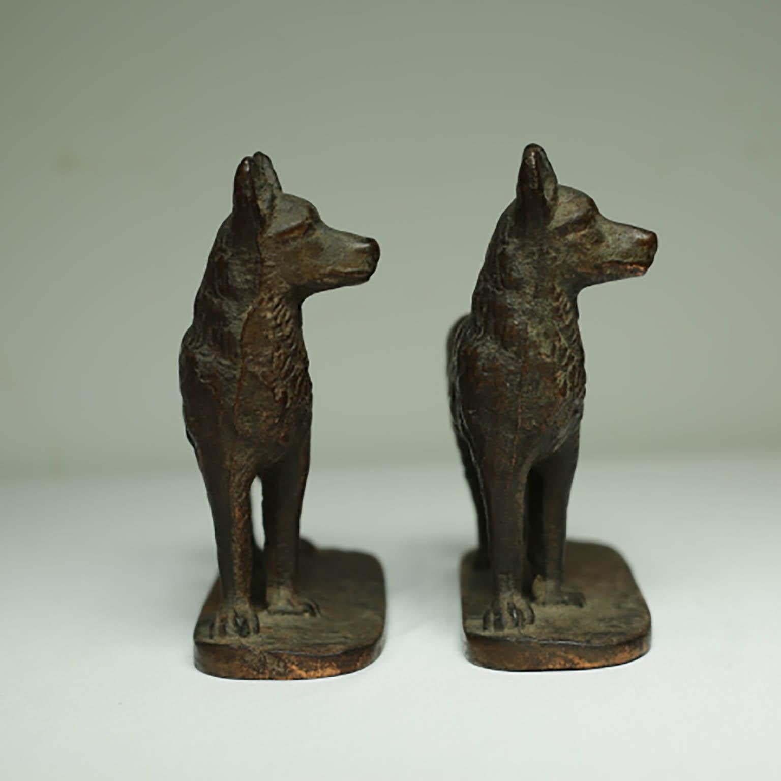 Beautiful pair of solid bronze bookends of German Shepards. Each are stamped on the base 