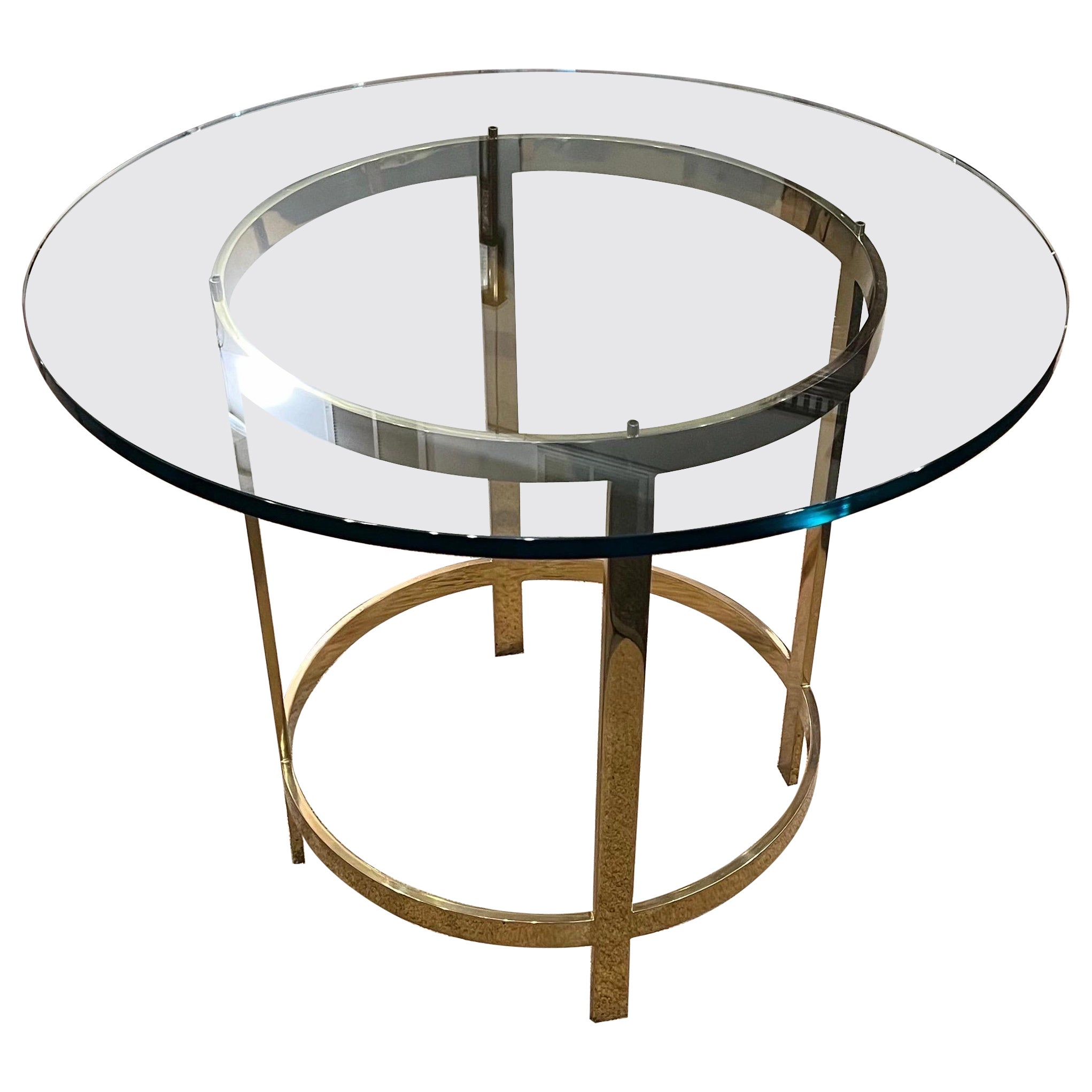 Mesa de centro con tapa de cristal de bronce macizo