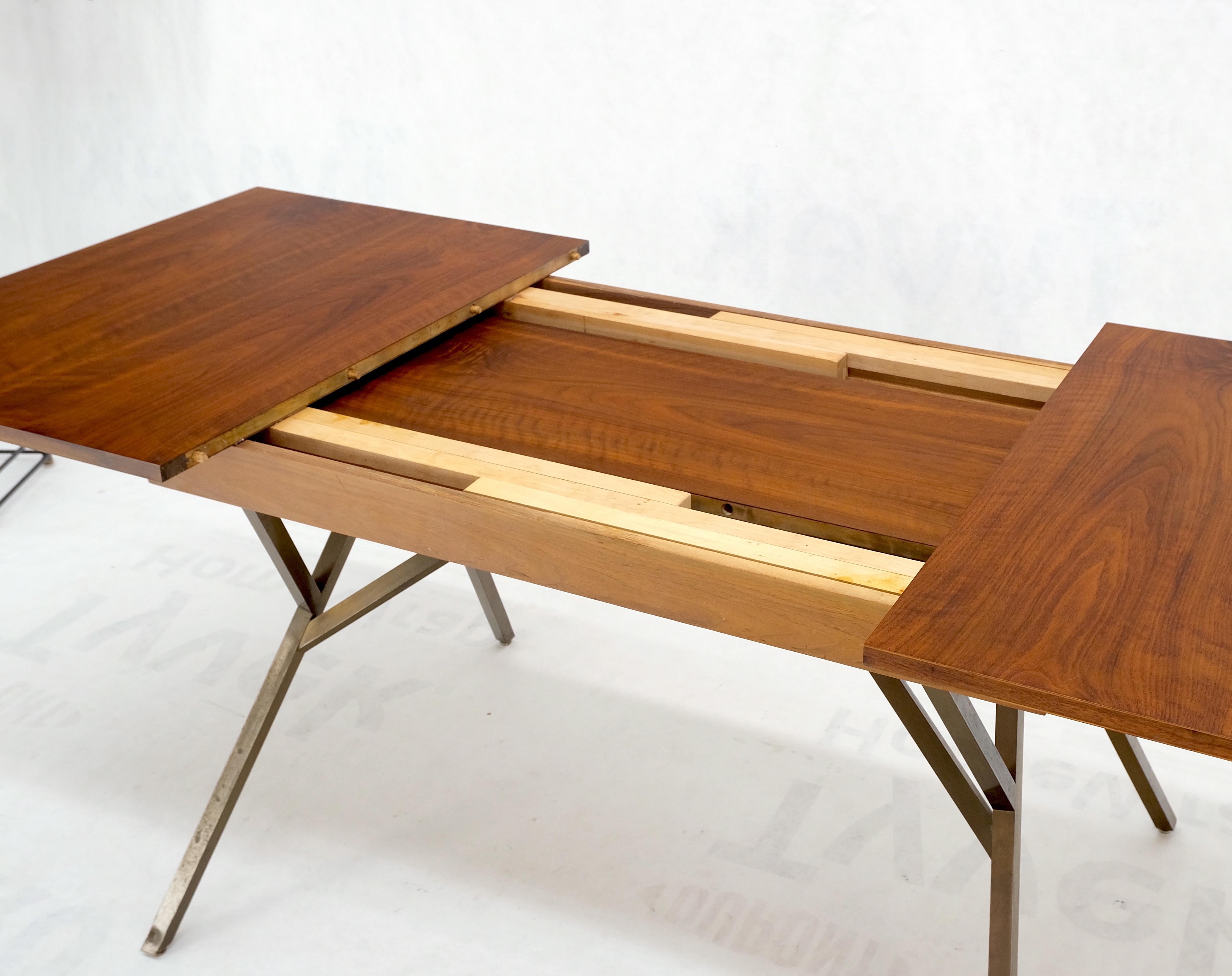 Mid-Century Modern solid bronze square profile two extension boards walnut top dining table mint!
Very unusual vintage circa 1970s table. Possibly custom design very much in style of George Nelson.
Two self storing leaves, twenty inch leaves for a
