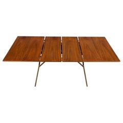Tavolo da pranzo in bronzo massiccio a profilo quadrato con due prolunghe e piano in noce Zecca!