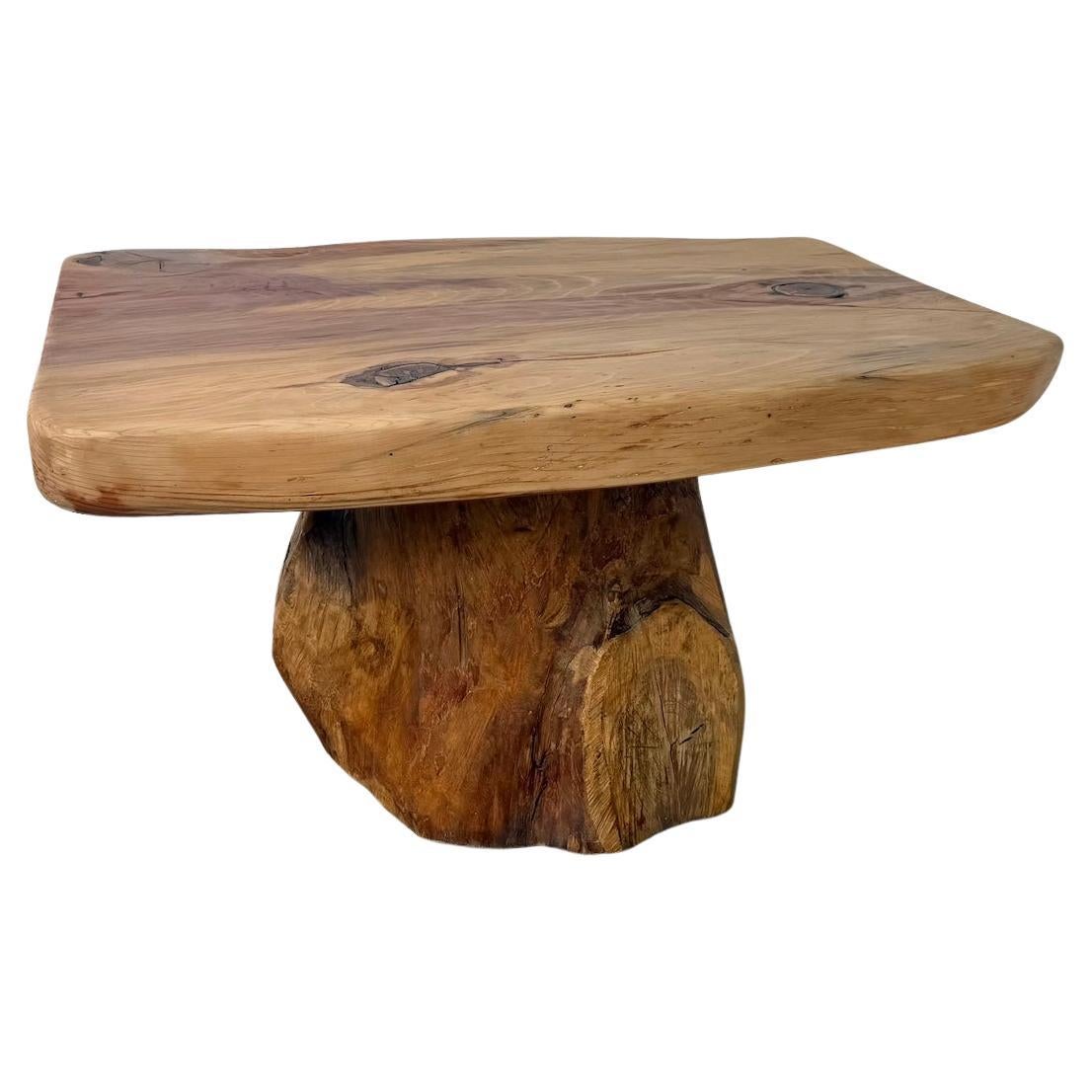 Solid brutalist cedar coffee table from the 1970s For Sale