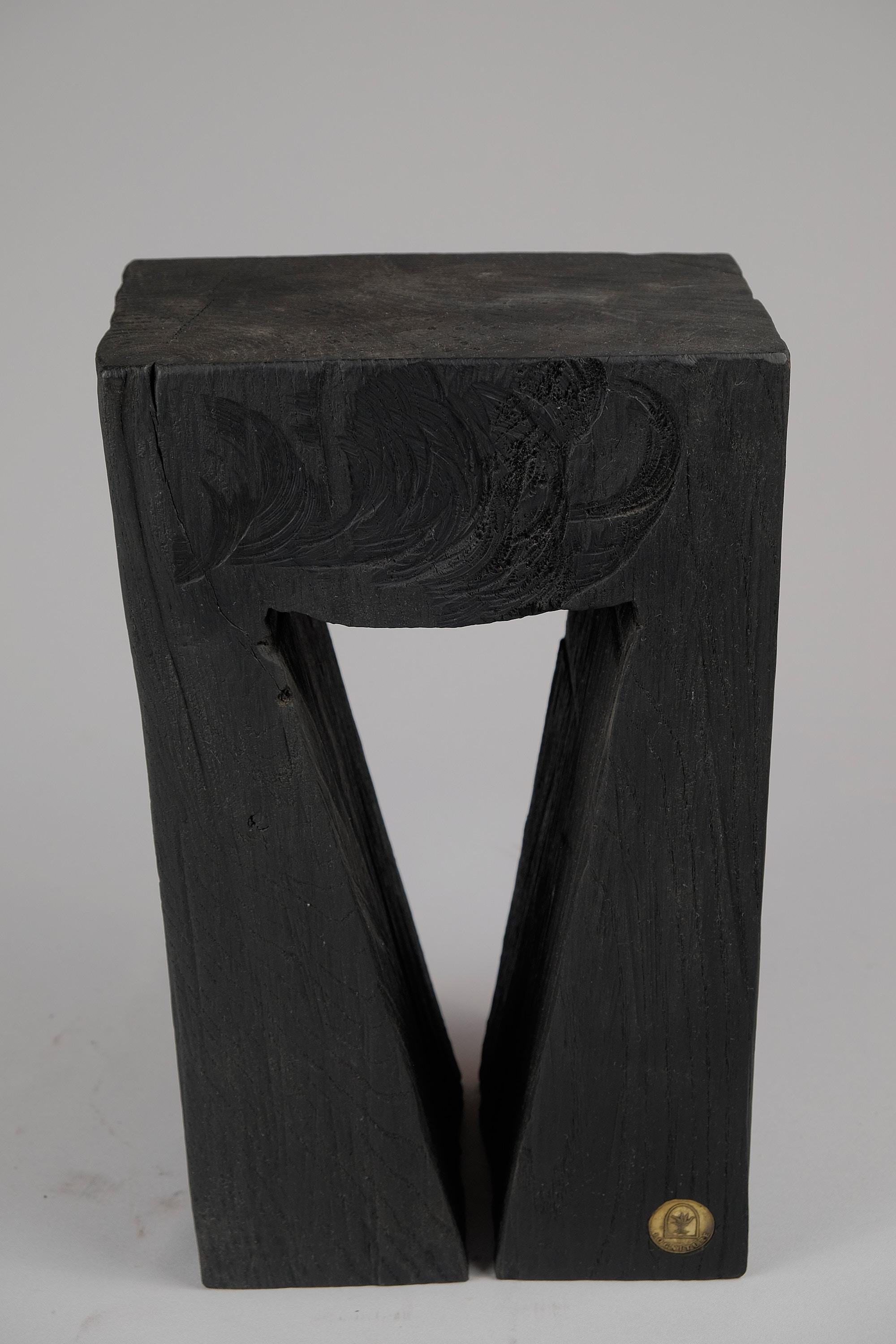 Unique chainsaw carved wooden contemporary rustic side table. Carved from a single piece of wood and protected with the highest quality oils, ensuring durability for generations. Such unique handmade design will highlight your interior and bring