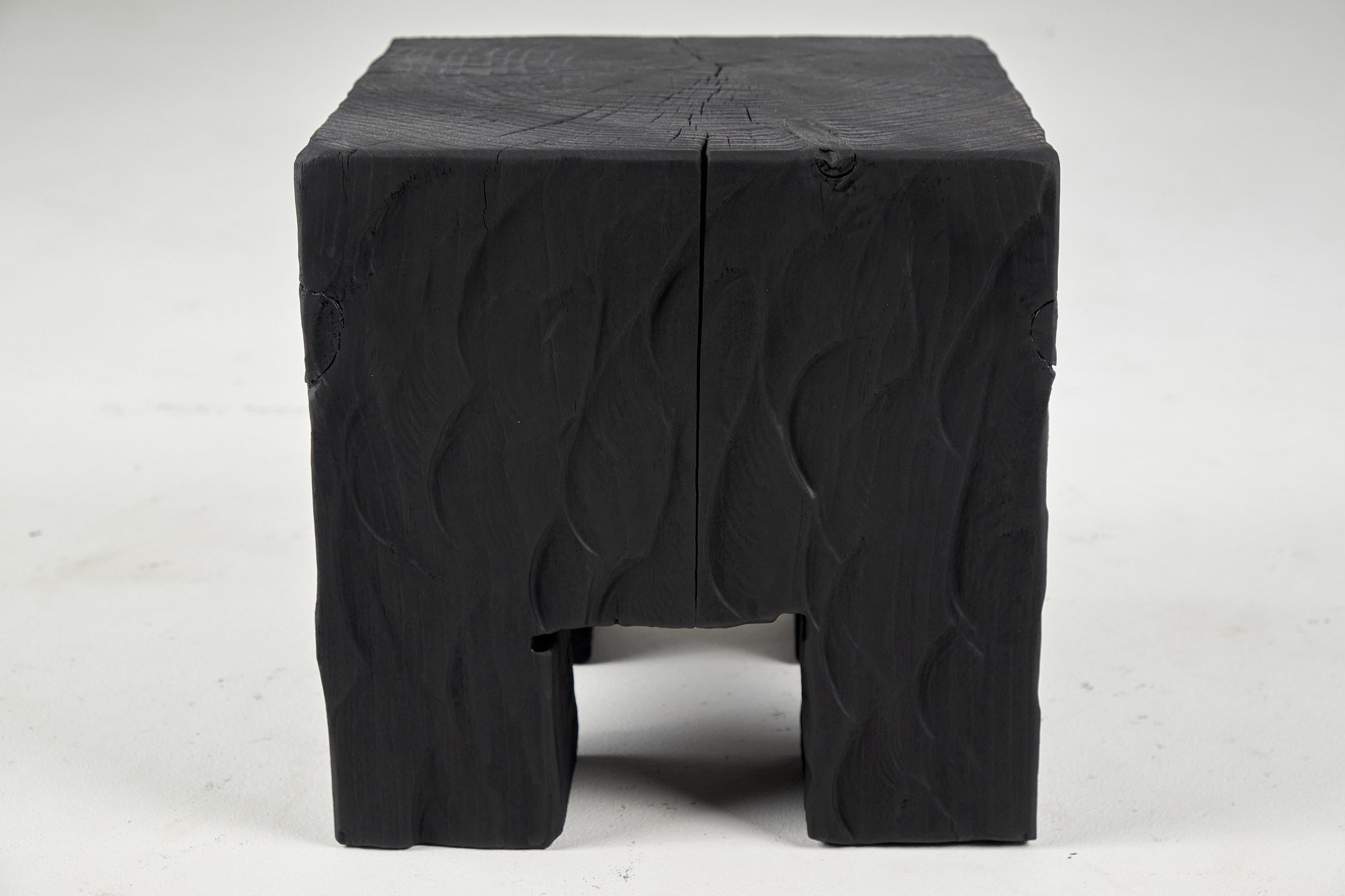 Unique chainsaw carved wooden rustic stool/side table. Carved from a single piece of wood and protected with the highest quality oils, ensuring durability for generations. Such unique handmade design will highlight your interior and bring comfort to