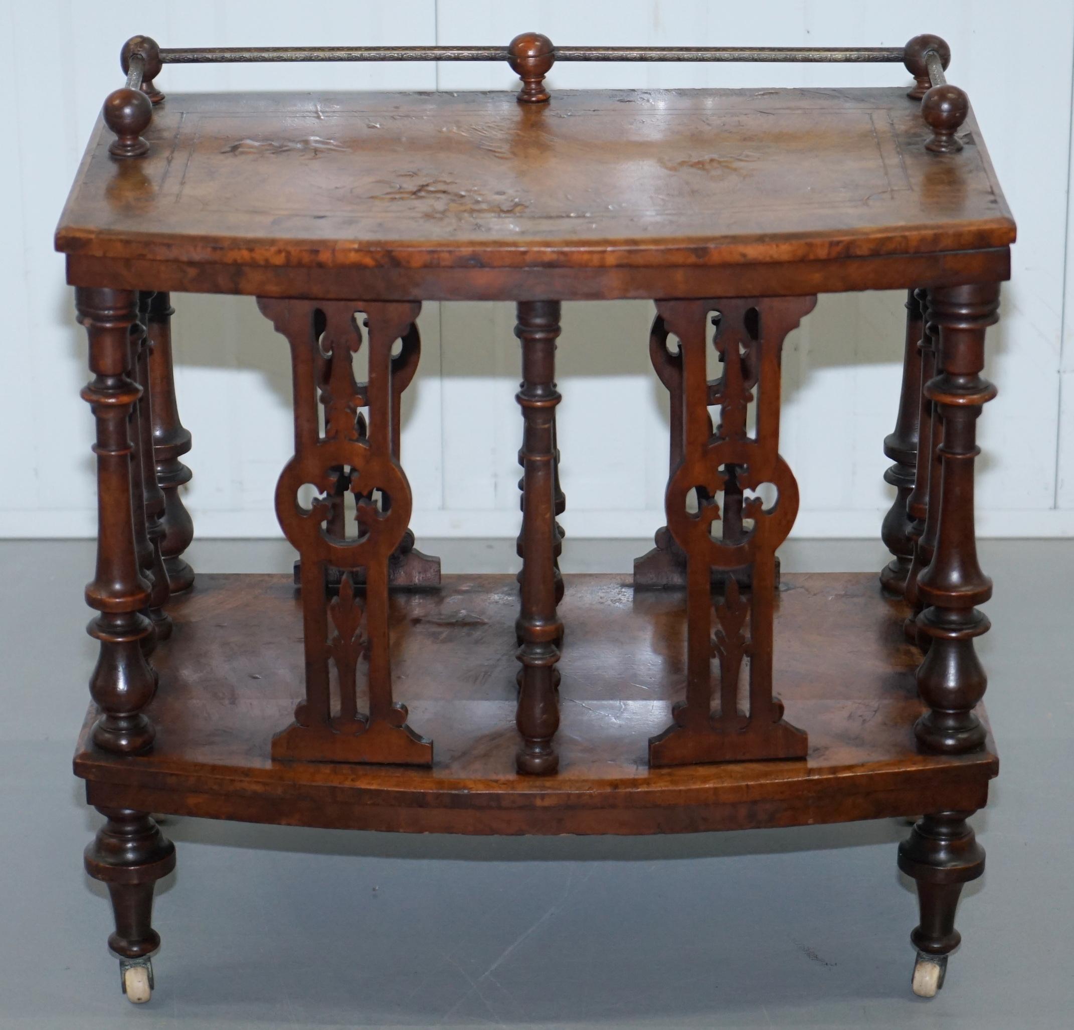 We are delighted to offer for sale this very rare solid Burr walnut Canterbury music stand with ornate carving, original castors and bronze engraved rails on top

A good looking rare and valuable piece of furniture, these sell for a small fortune