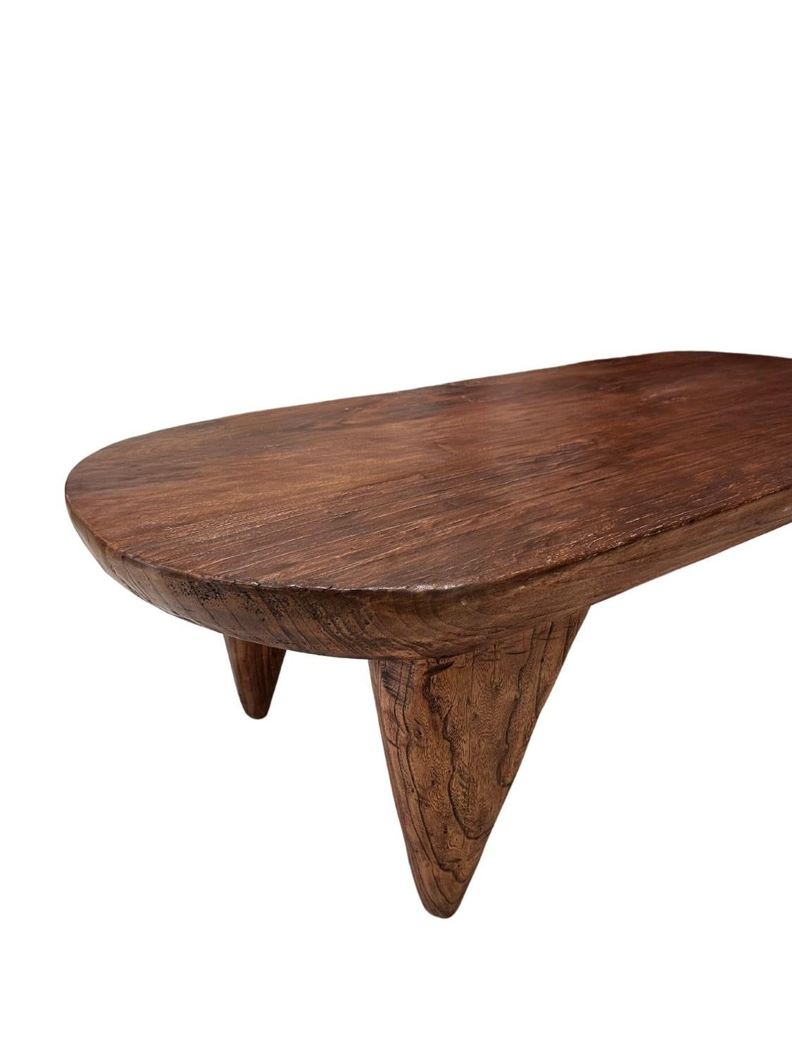 Crafted from premium camphor wood, this sofa table radiates natural elegance with its intricate grain patterns and distinctive aroma. With a design that seamlessly blends rustic charm and modern sophistication, it offers a sturdy yet stylish surface