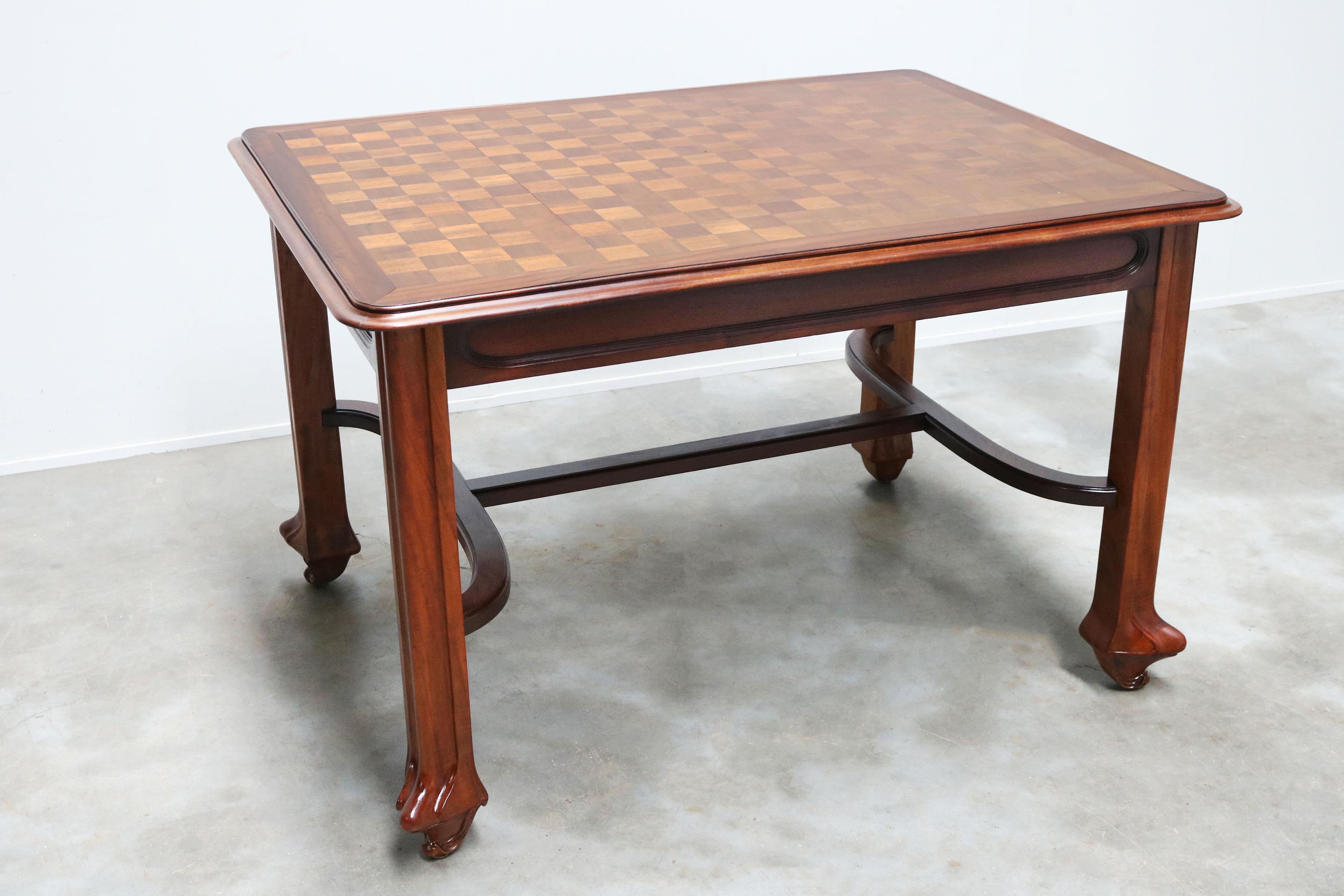 Art Nouveau Solid carved mahogany Art nouveau table by Maison Gouffe with Inlaid top 1902 For Sale