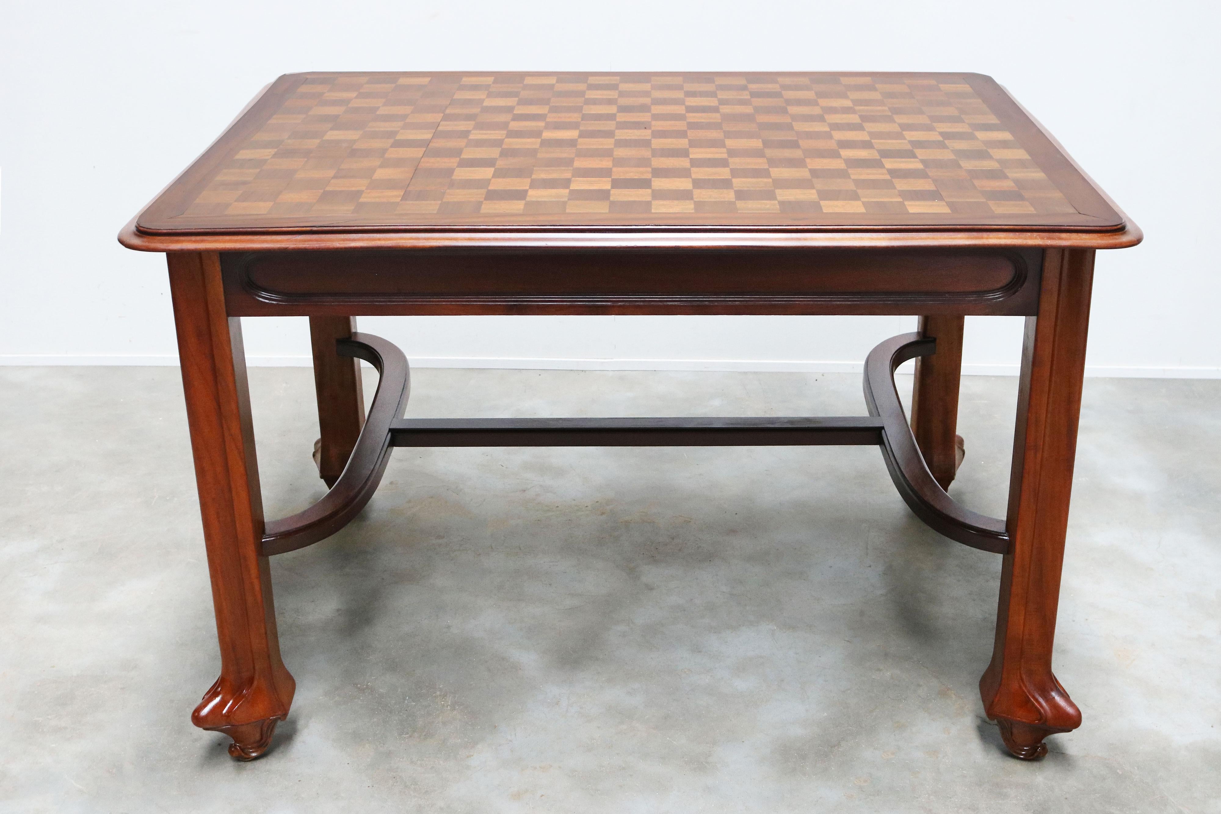 Solid carved mahogany Art nouveau table by Maison Gouffe with Inlaid top 1902 In Good Condition For Sale In Ijzendijke, NL