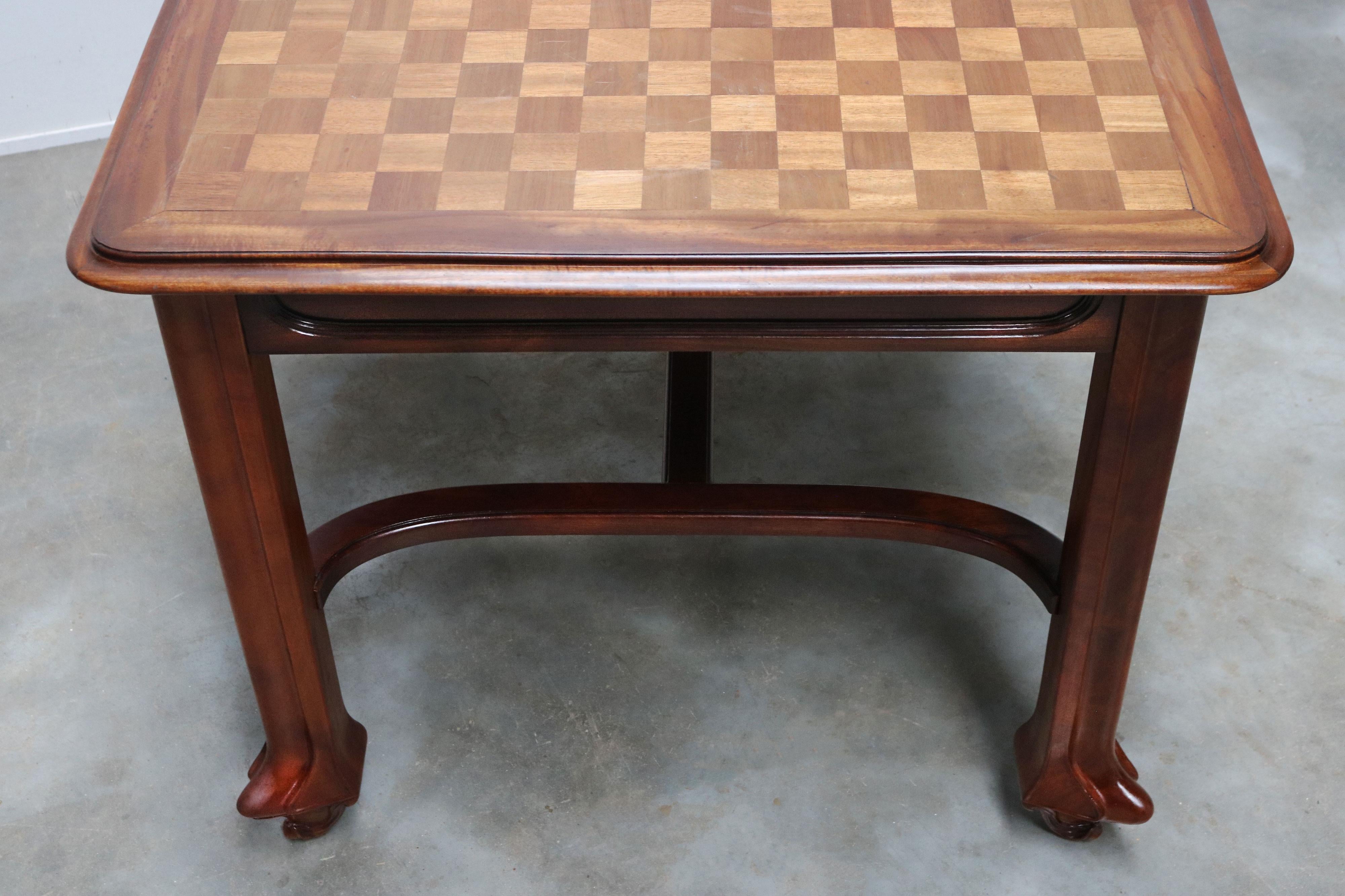 Glass Solid carved mahogany Art nouveau table by Maison Gouffe with Inlaid top 1902 For Sale