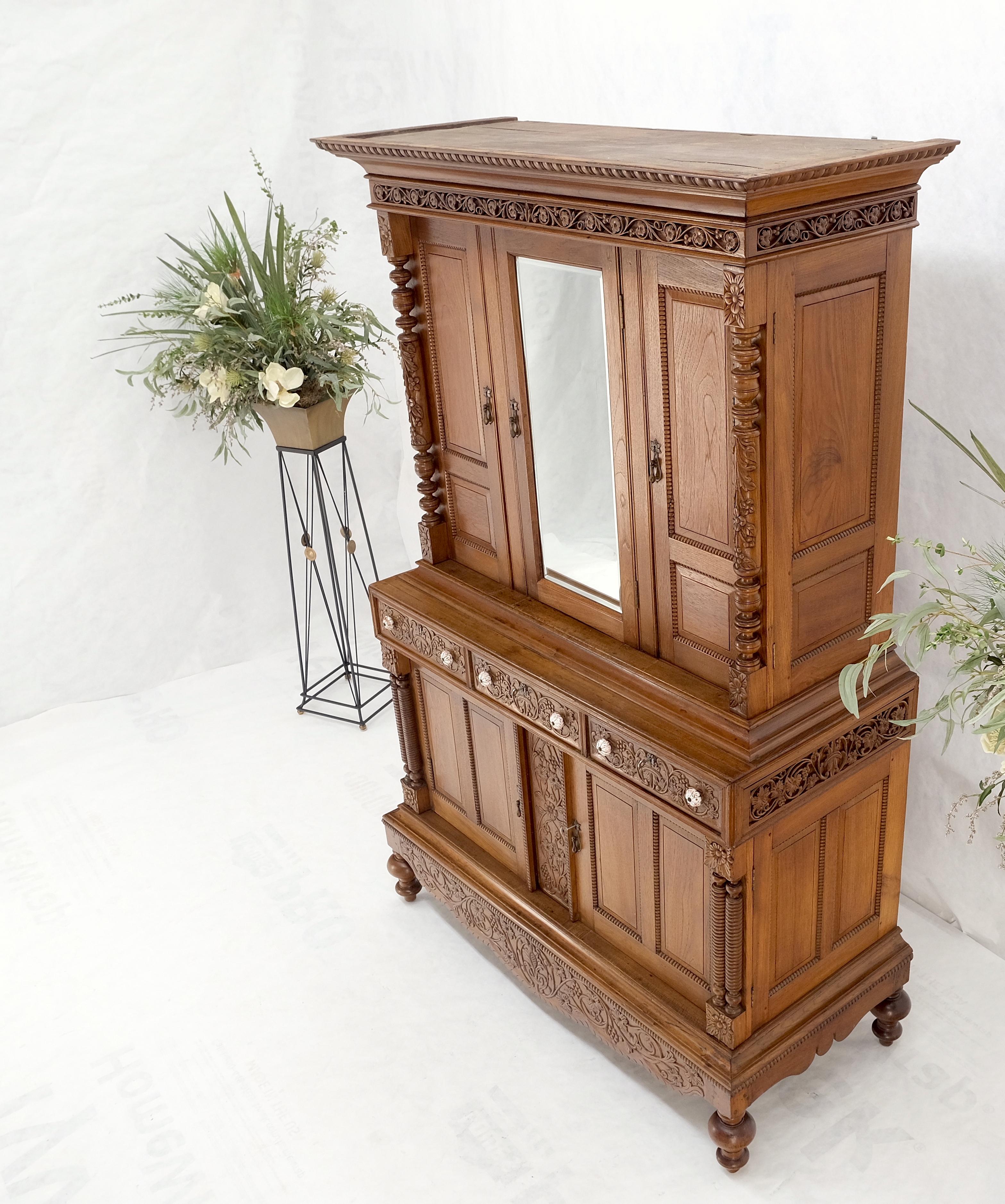 Solid carved teak antique two part cupboard cabinet with unique feature mint!
Please see the video featuring the unique secret or child proof drawer.
Cabinet is beautifully polished and has very gorgeous amber tone solid teak color.
