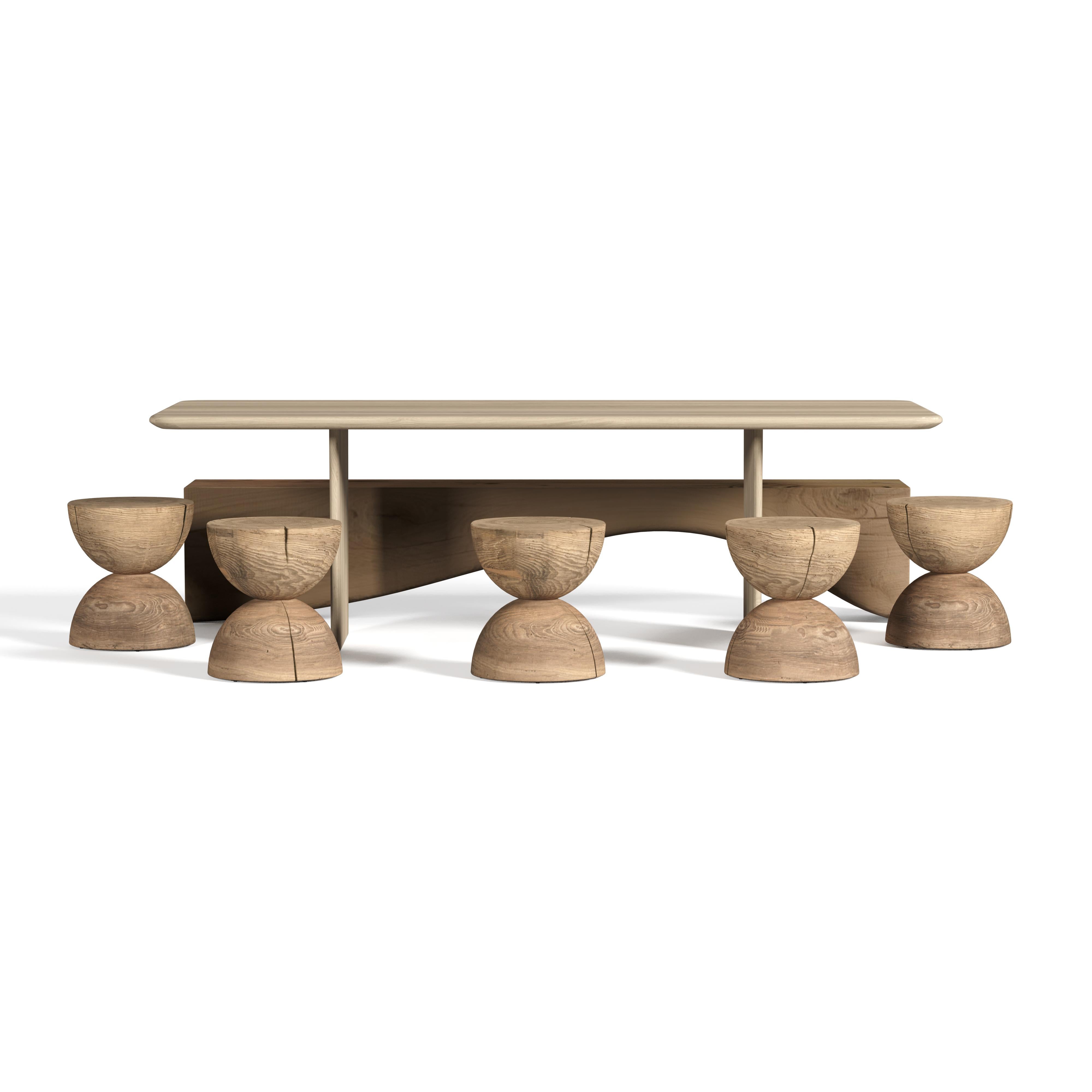 This outdoor collection, entirely crafted in Italy, features a dining table, stools, and a bench made from cedar wood, all designed for outdoor use.

Table with structure in cedar wood ,with smooth, rounded sides. Its top and legs have a slender