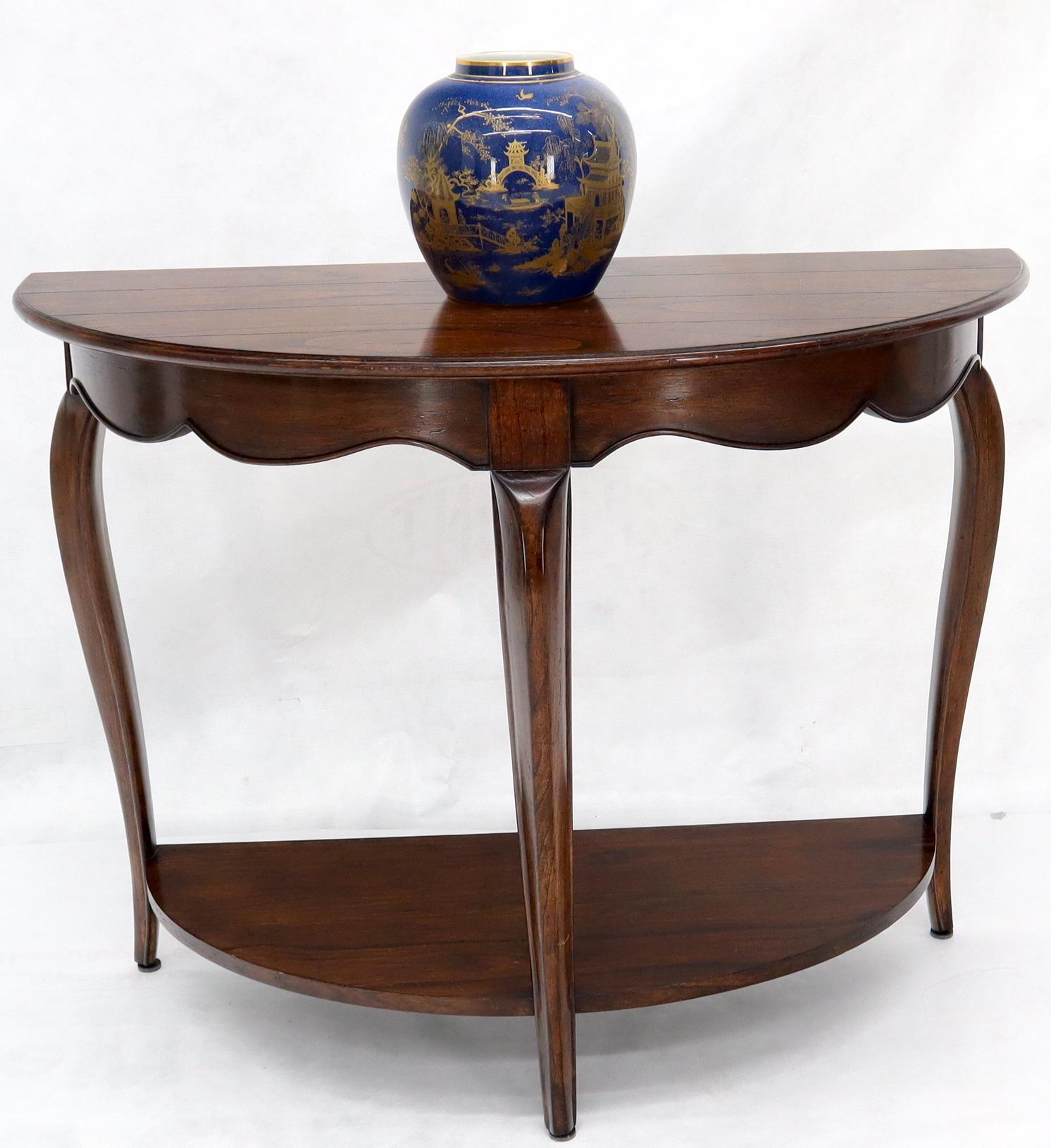 Demilune half round shape cabriole leg satin finish solid cherry one shelf wall hall table console by Baker.