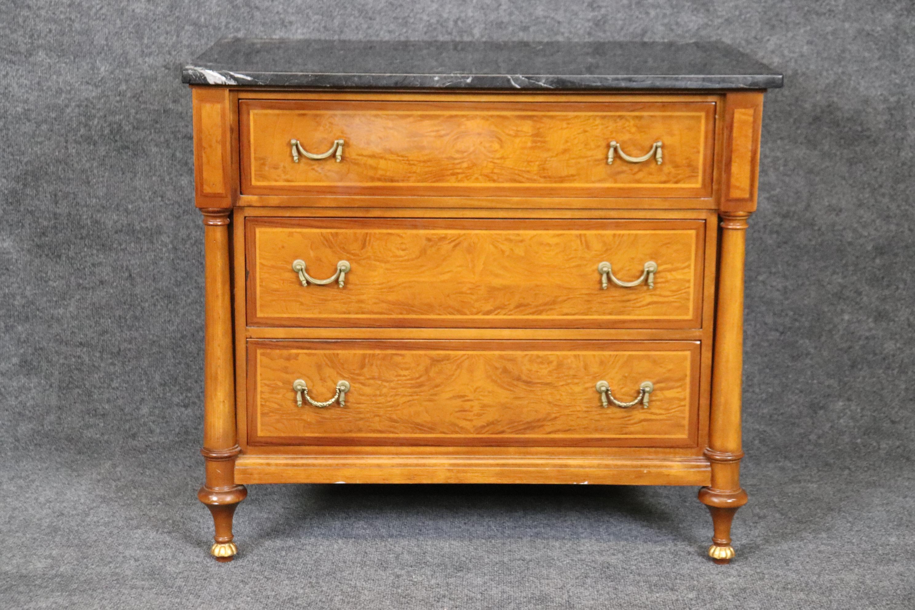 This is a gorgeous solid cherry, fully dove-tailed marble top nightstand. The piece is in good vintage condition and has no significant signs of age or damage to mention. Measures 32 wide x 28.5 tall x 20 deep. Dates to the 1990s era. 