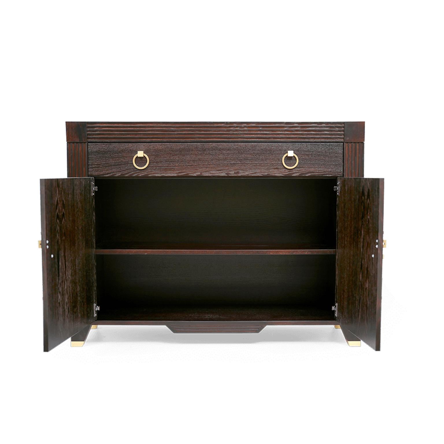 The sideboard hero is a modern living room cabinet, perfect for organizing and storing all your belongings. Its features include two spacious drawers and a large shelve behind two doors for your storage. Featuring a dark brown finish and creatively