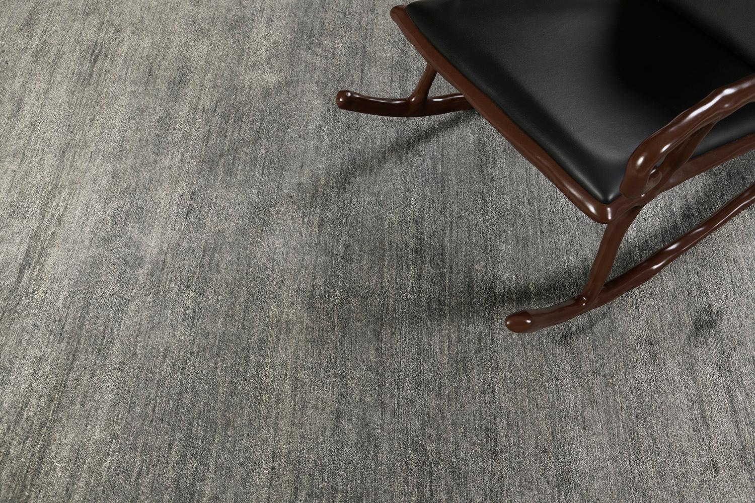 Dara' is the most sought-after rug in the Elan Collection in the mesmerizing shade of neutral grayish brown. Its simplicity does not take away from the rug's luxurious quality and beautiful sheen made of bamboo silk. Dara is a fabulous rug for any