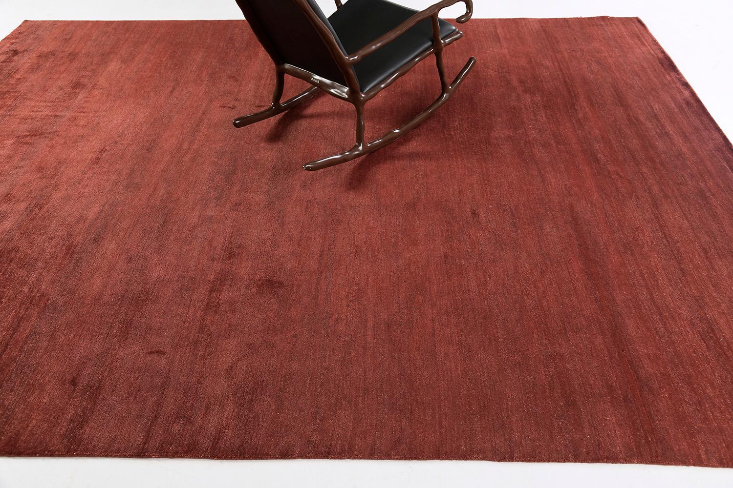 Dara' is a sought-after rug in the Elan Collection in the mesmerizing shade of ruby red. Its simplicity does not take away from the rug's luxurious quality and beautiful sheen made of bamboo silk. Dara is a fabulous rug for any design