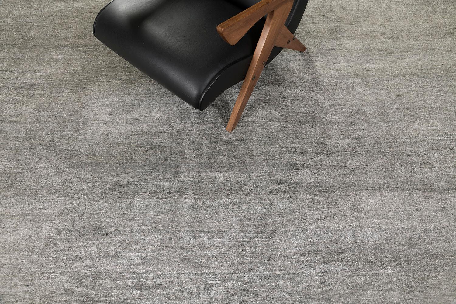Dara' is a sought-after rug in Elan Collection in the mesmerizing shade of dark gray. Its simplicity does not take away from the rug's luxurious quality and beautiful sheen made of bamboo silk. Dara is a fabulous rug for any design space.


Rug