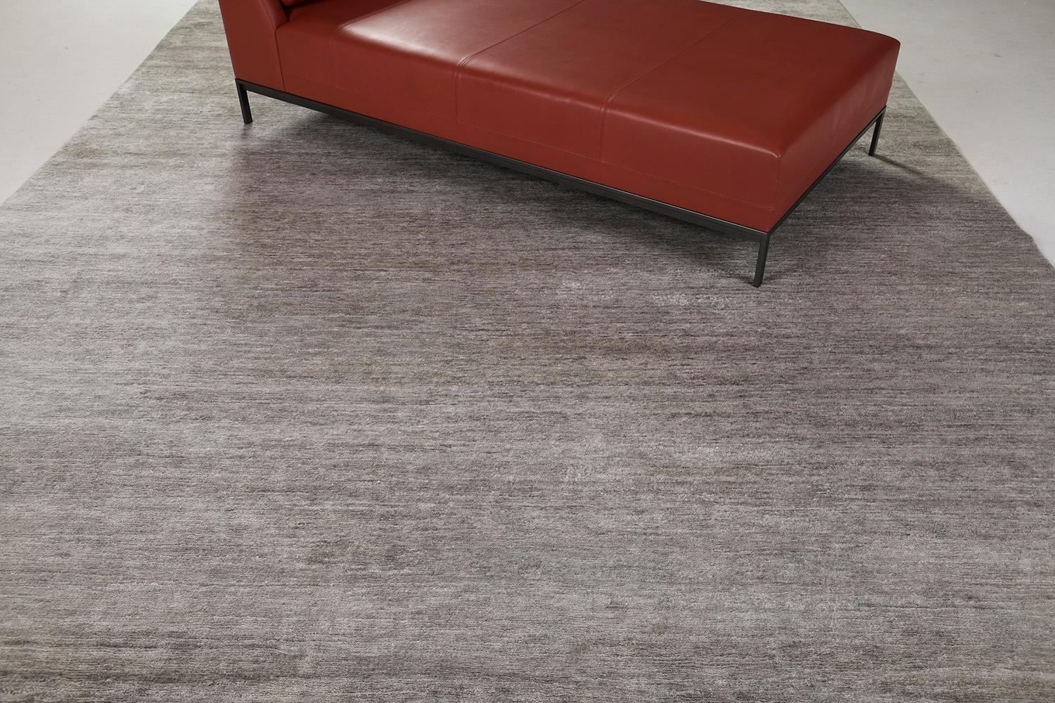 Dara' is a sought-after rug in Elan Collection in the mesmerizing shade of neutral light gray. Its simplicity does not take away from the rug's luxurious quality and beautiful sheen made of bamboo silk. Dara is a fabulous rug for any design