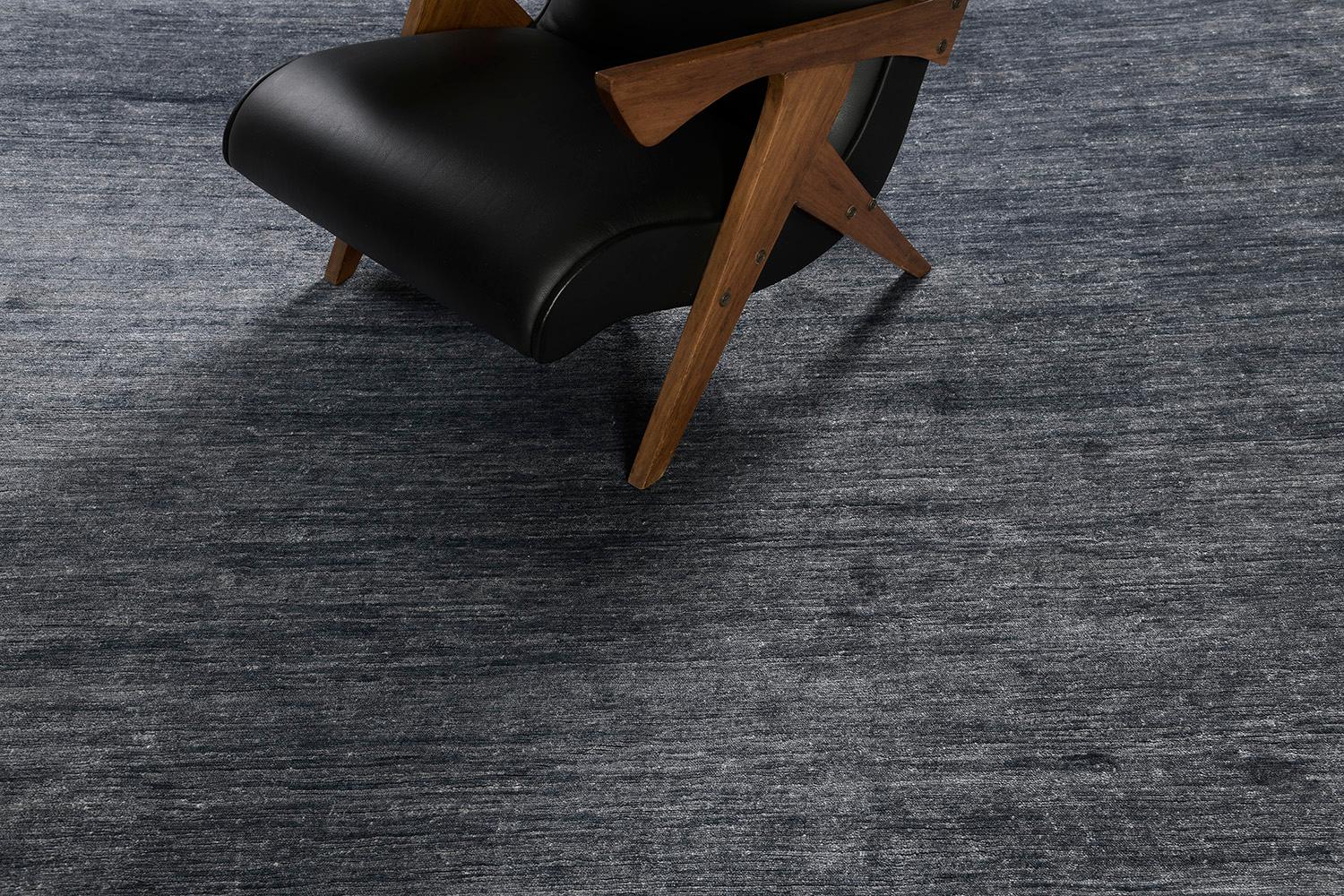 Dara' is a sought-after rug in Elan Collection in the mesmerizing shade of midnight blue. Its simplicity does not take away from the rug's luxurious quality and beautiful sheen made of bamboo silk. Dara is a fabulous rug for any design