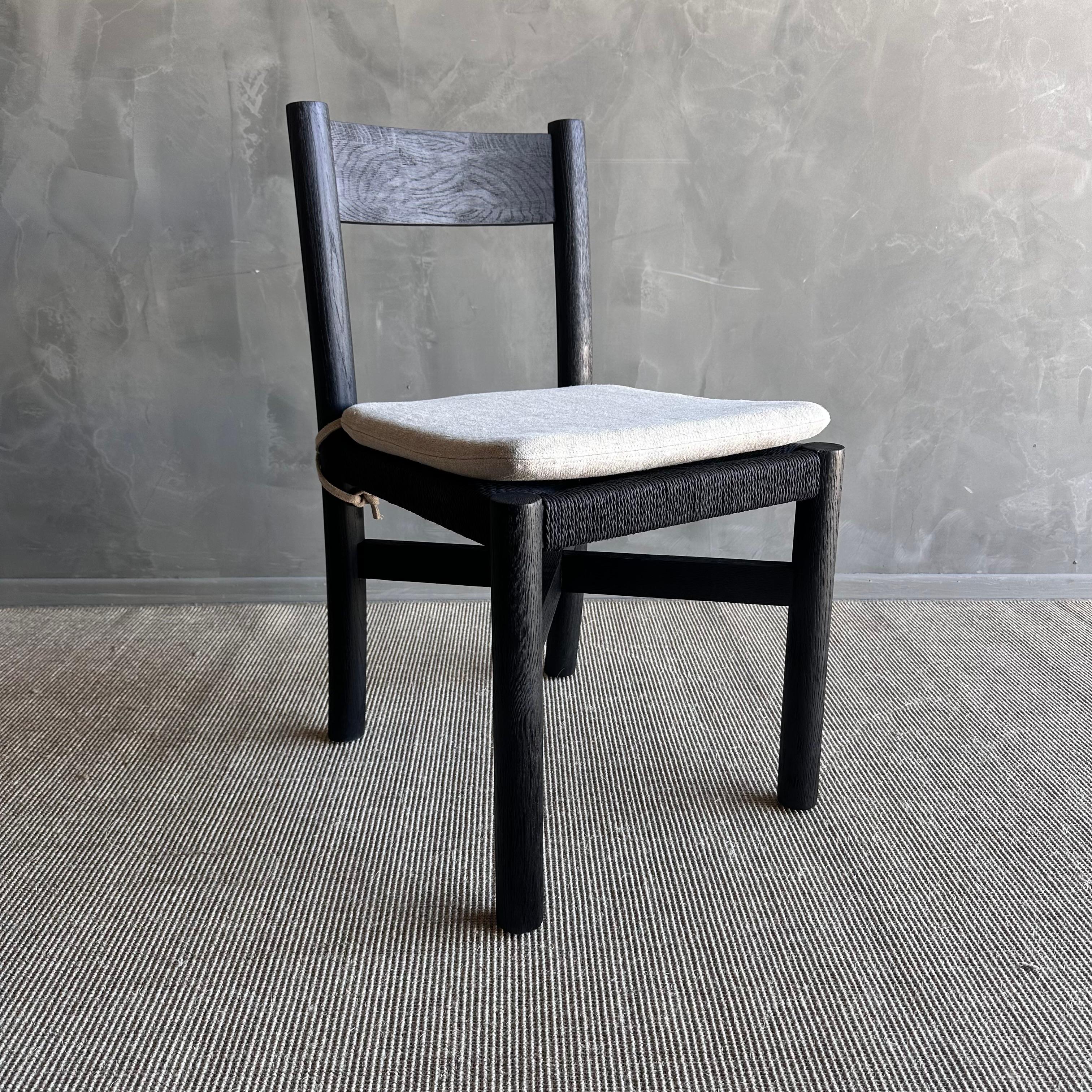 Organic Modern Solid Ebonzied White Oak Dining Chair with Woven Seat and Linen Cushion For Sale