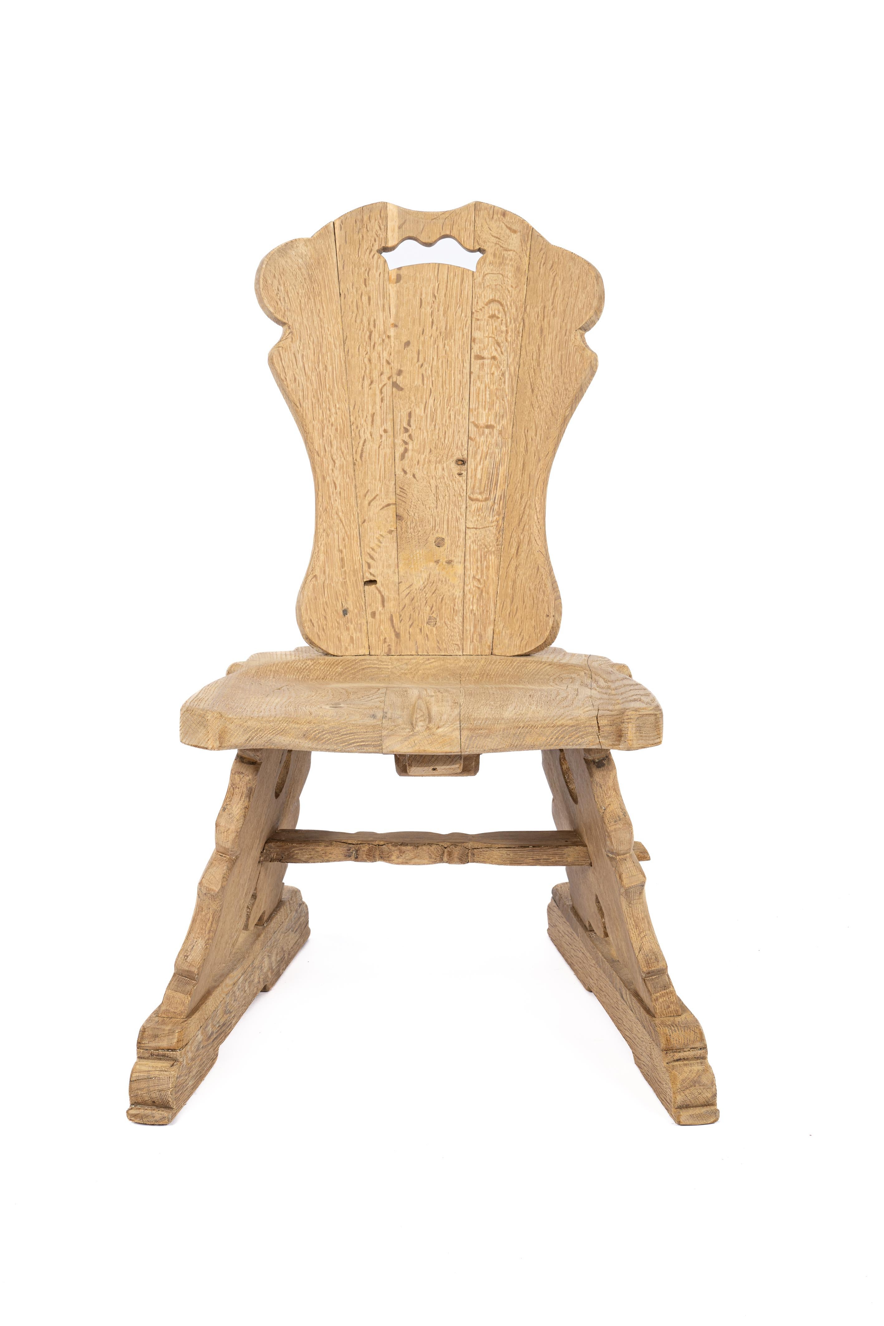 The chair offered here was crafted by master furniture maker Piet Rombouts around 1950. The chair was made from the finest quarter-sawn summer oak available. The wood is very stable and features a beautiful grain pattern with natural appearance. The