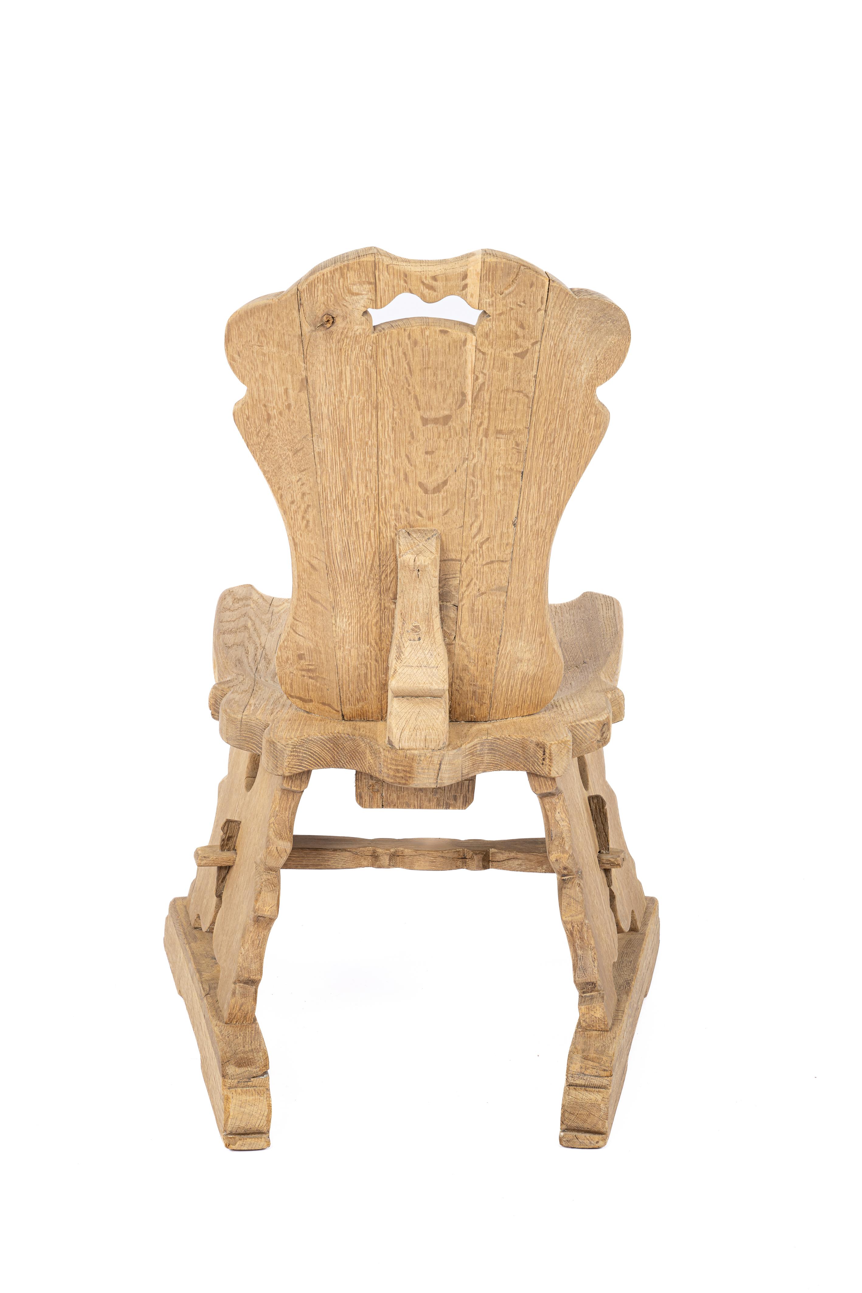 Dutch Solid European Oak sculpted chair made by Piet Rombouts circa 1950 Netherlands For Sale