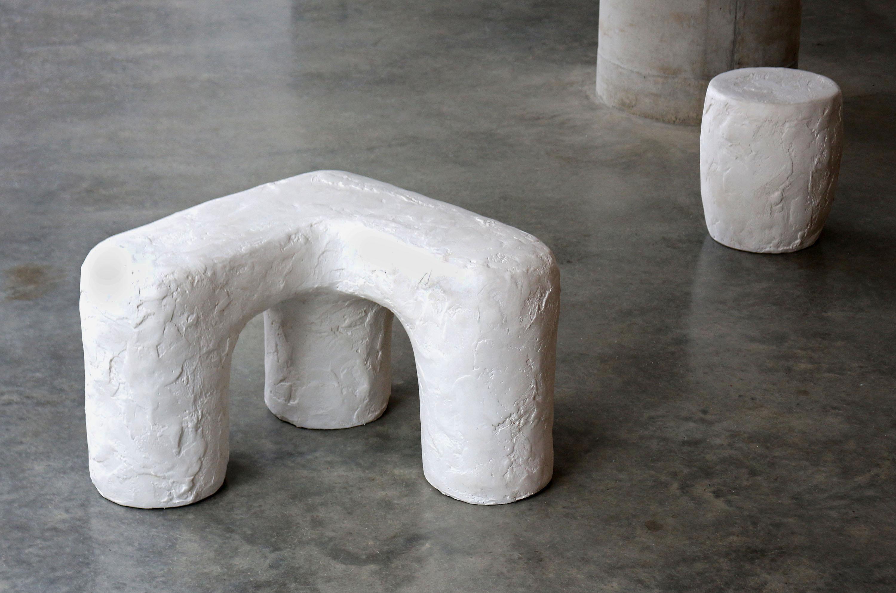 The solid fluid spackle bench is a three-legged bench designed to reflect, imply, or oppose corners. The Solid Fluid Series displays slow and shifting movement that has been frozen and solidified in a moment.

Dimension: 76 cm x 76 cm x 53cm