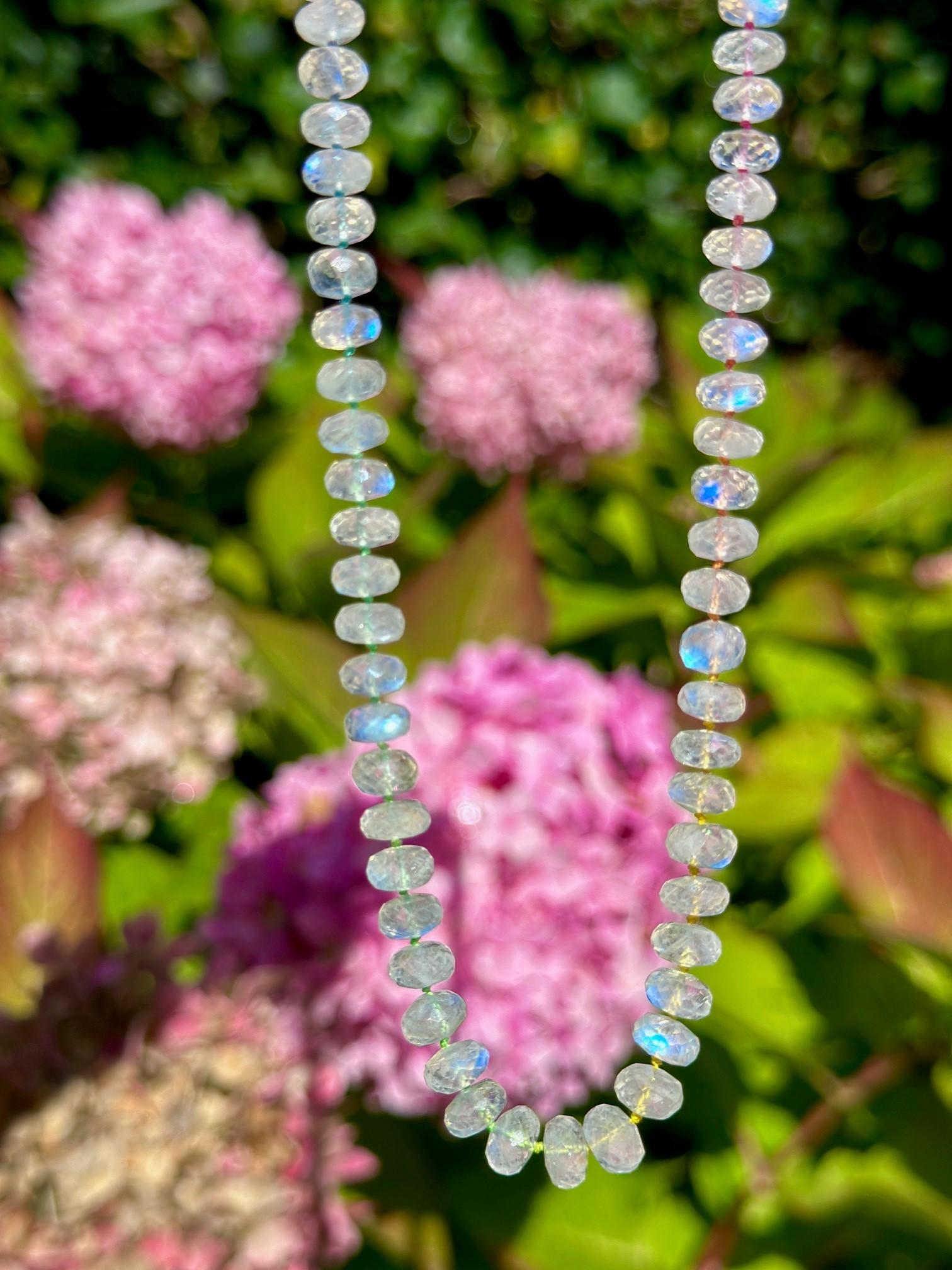 
A one of a kind sparkling rainbow moonstone necklace that reflects all the hues of the rainbow spectrum. 

All 85 hand carved rainbow moonstone beads are carefully selected and methiciously hand knotted on multicolor silk to compose a timeless
