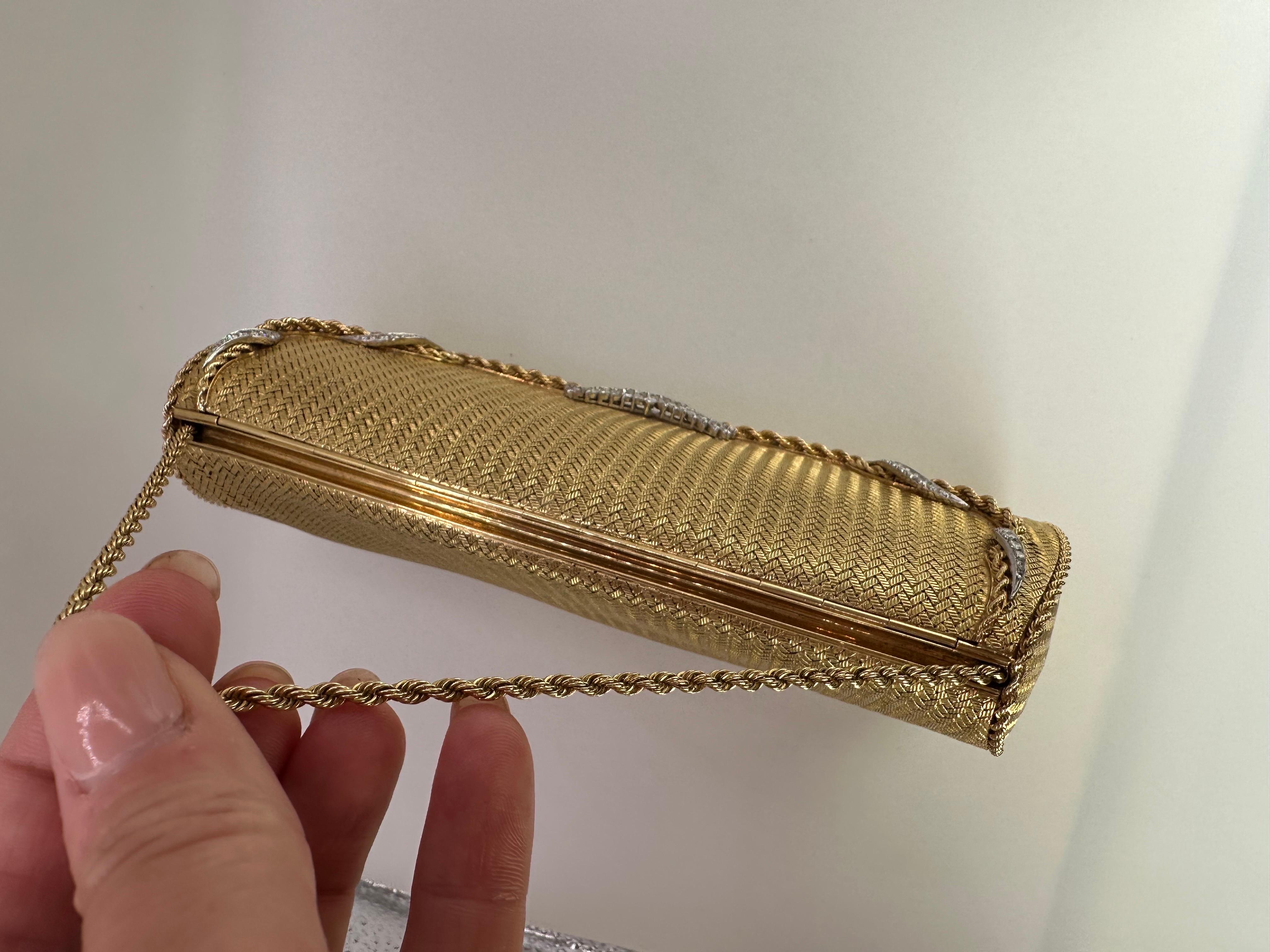 Rare find! Solid gold mesh purse made in 18 Karat yellow gold with natural diamonds. Over 1.50 carats of natural round and marquise diamonds, one of a kind purse versatile can be used as a clutch or a hanging purse. Please watch the video!


GOLD: