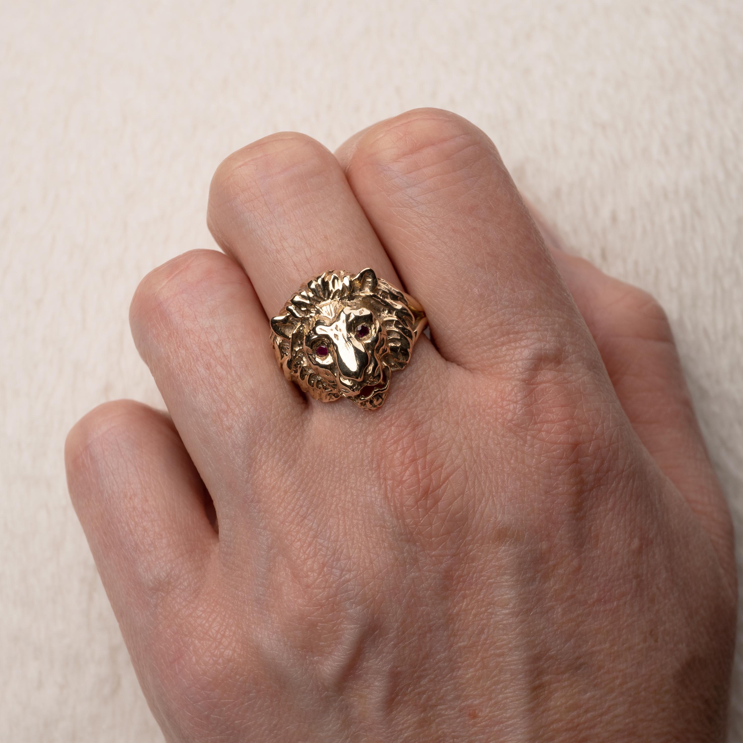 gold lion head ring with ruby eyes