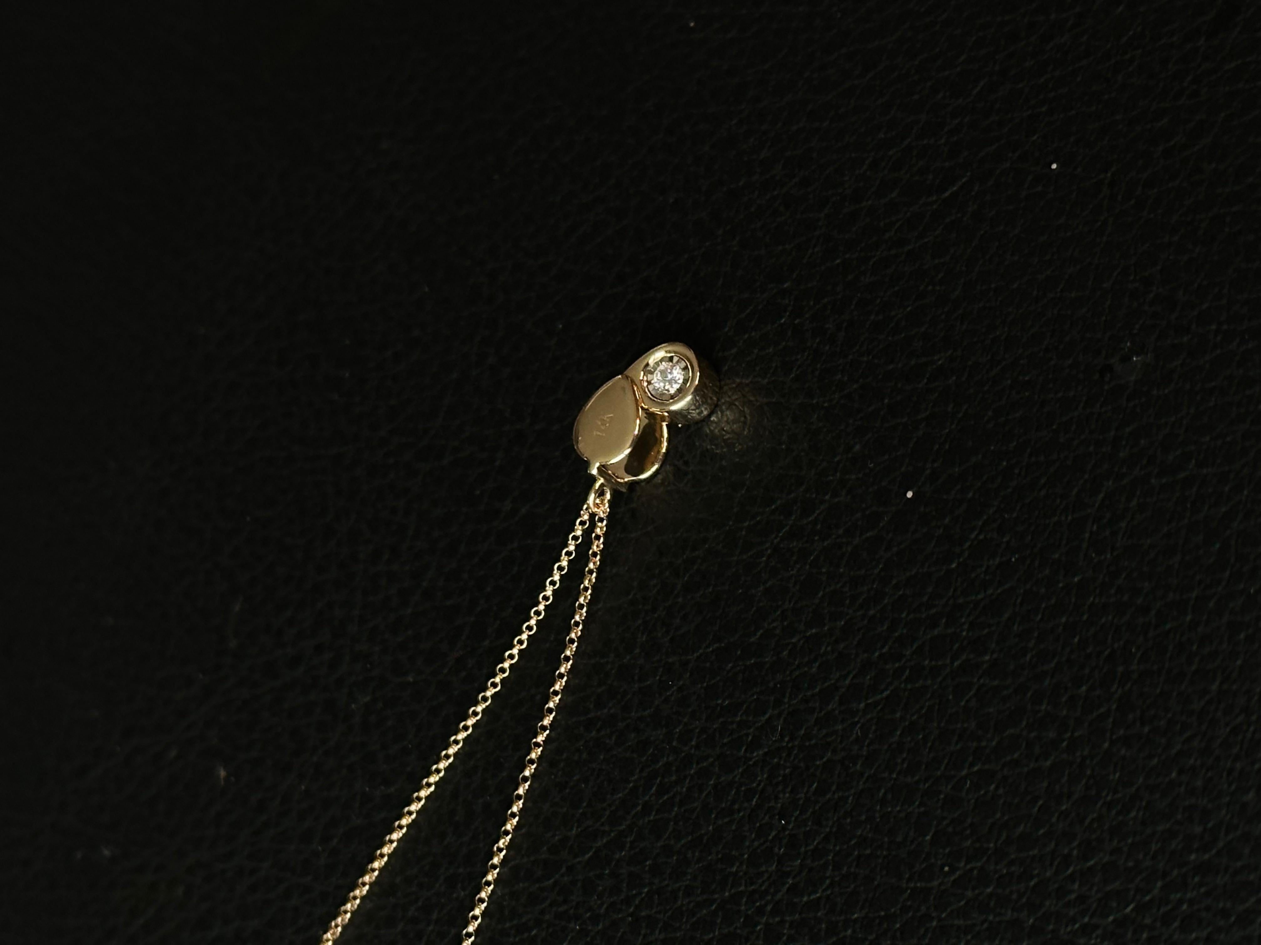 14k Gold Diamant-Lupen-Halskette

Diese Halskette wurde von einer Juwelierlupe inspiriert und ist aus massivem 14-karätigem Gelbgold und natürlichen Diamanten gefertigt. Sie ist außerdem  Dieses Design liegt mir sehr am Herzen, denn als Juwelier