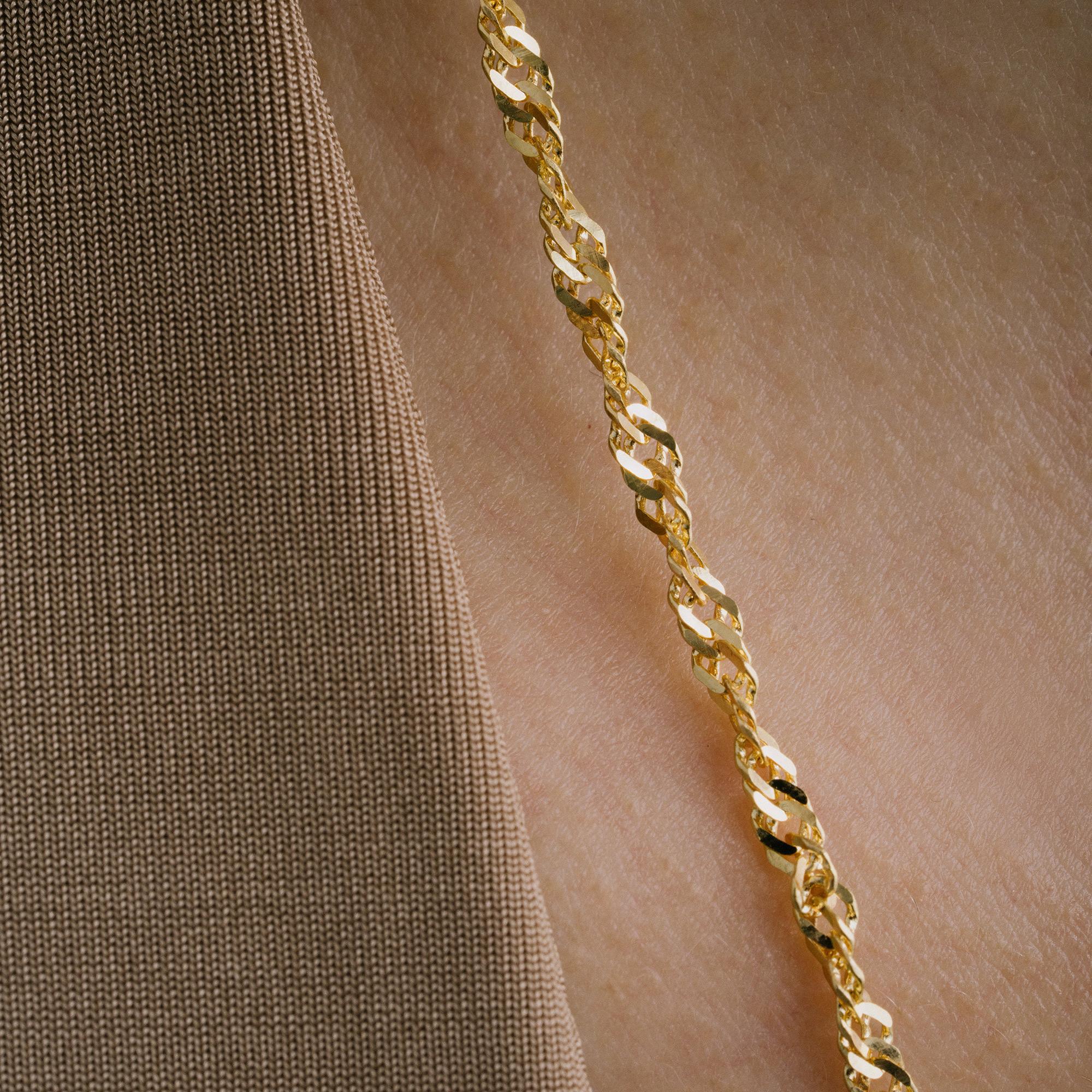 Exclusively crafted from genuine gold, Zelveti jewelry embodies purity and longevity. Available in 14 or 18 karat gold, Zelveti jewels are designed to whisper to your soul and carry forward your story across generations. The hallmark of 585 (14