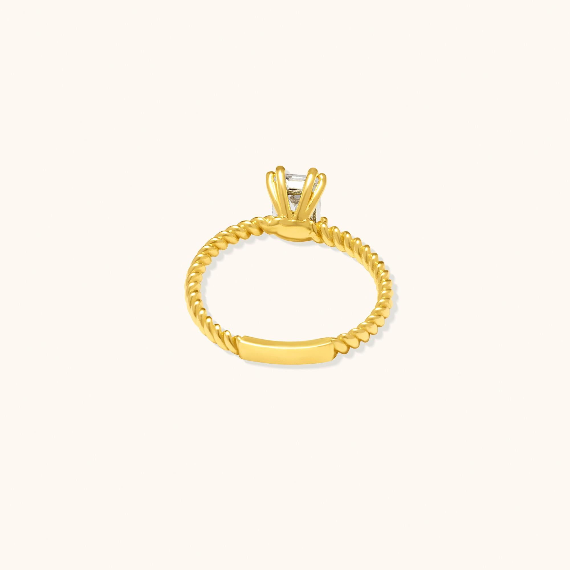 Stapelbarer Ring aus massivem Gold mit gedrehtem Zirkon im Smaragdschliff und minimalistischem 14 Karat (Moderne) im Angebot