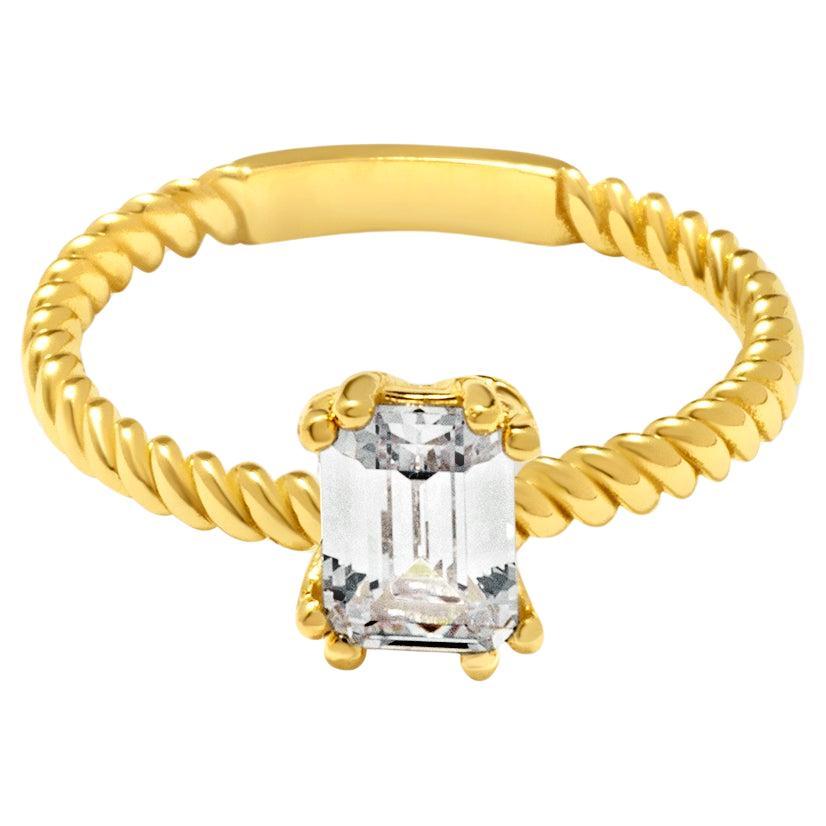 Stapelbarer Ring aus massivem Gold mit gedrehtem Zirkon im Smaragdschliff und minimalistischem 14 Karat im Angebot