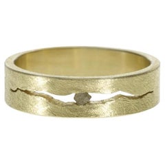 Solid Gold ring with a Raw Diamond