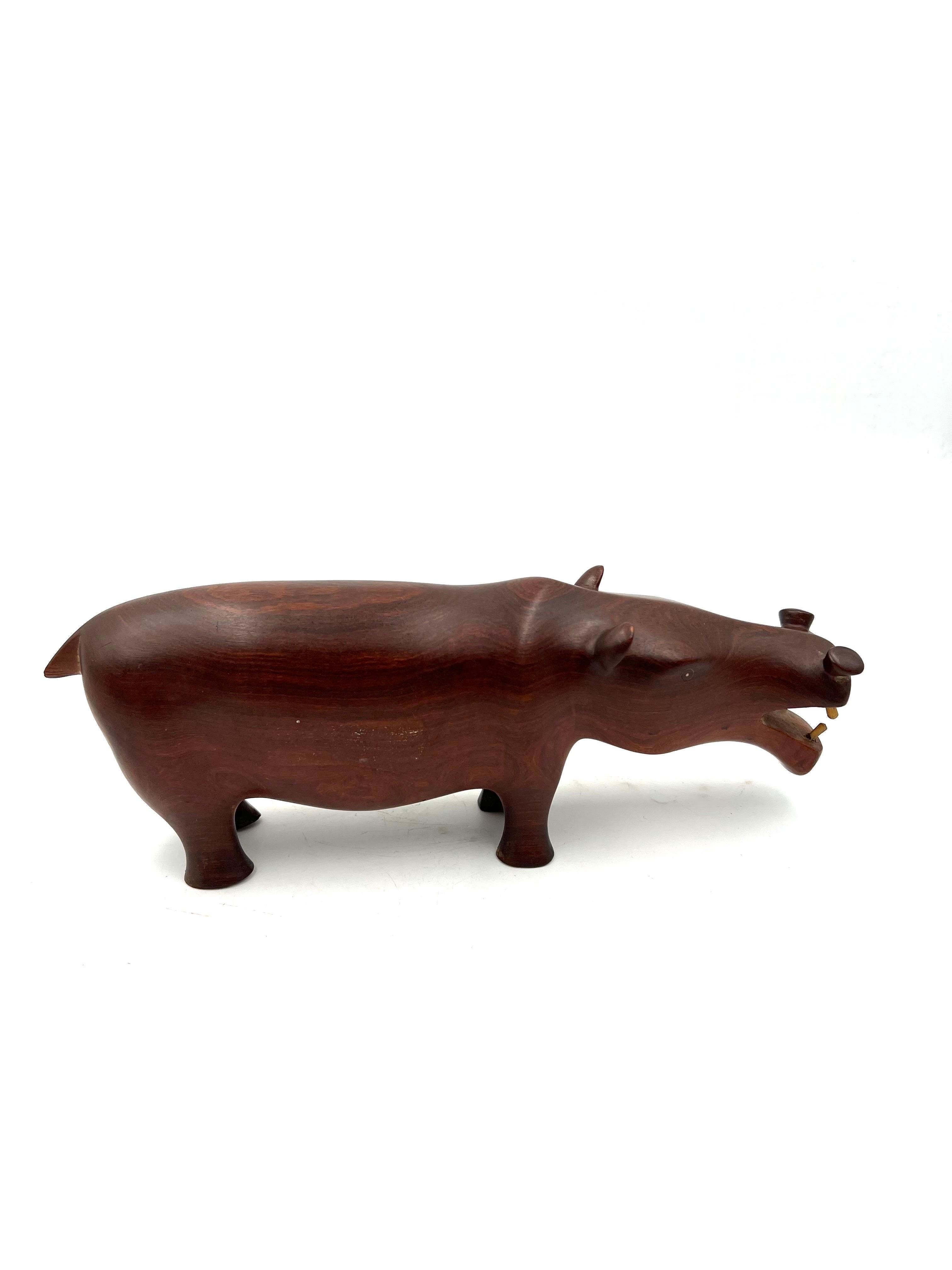 hand carved wooden hippo