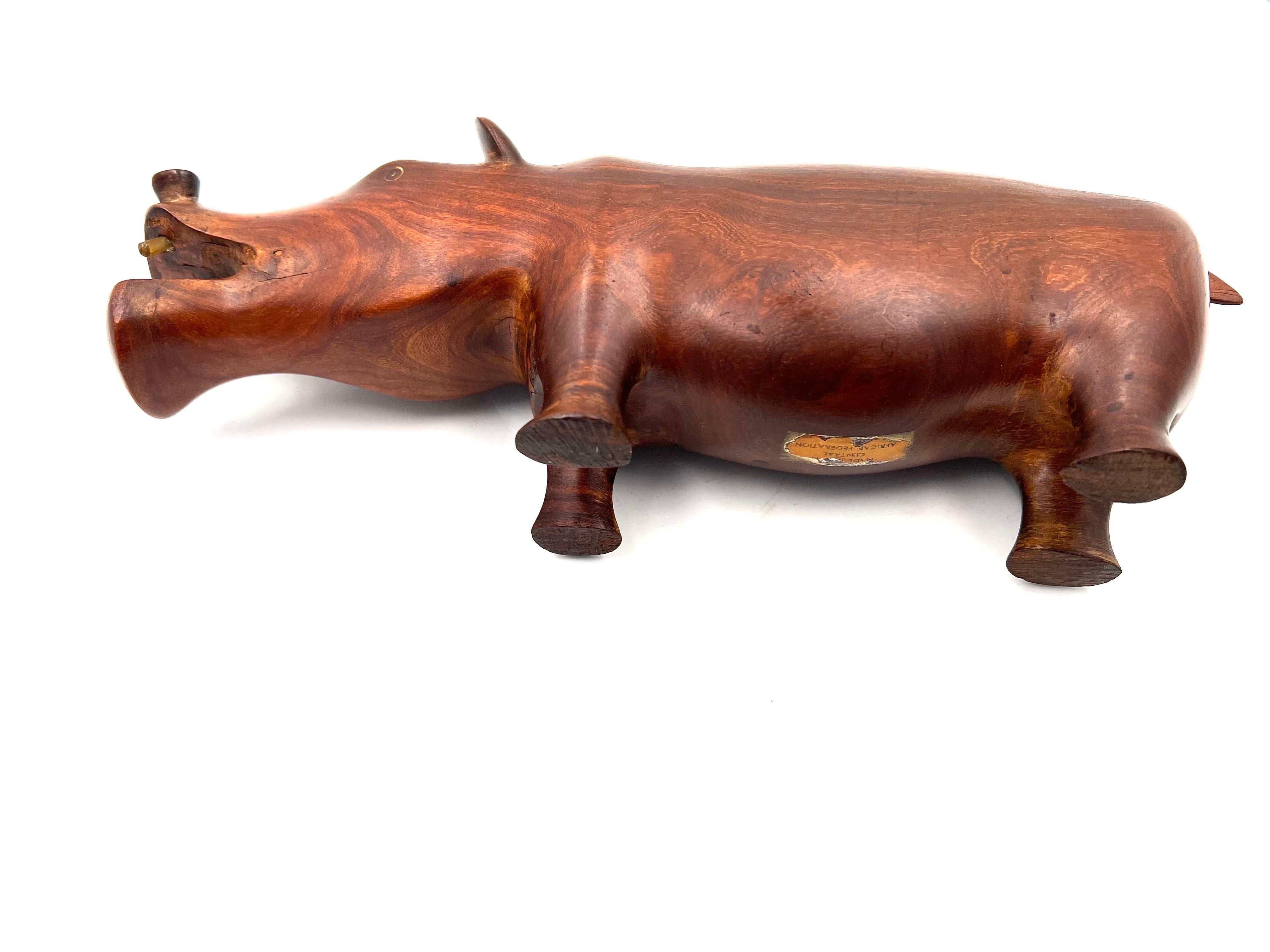 Mid-Century Modern Solid Hand Carved Rosewood African Hippo Sculpture with Bone Teeth For Sale