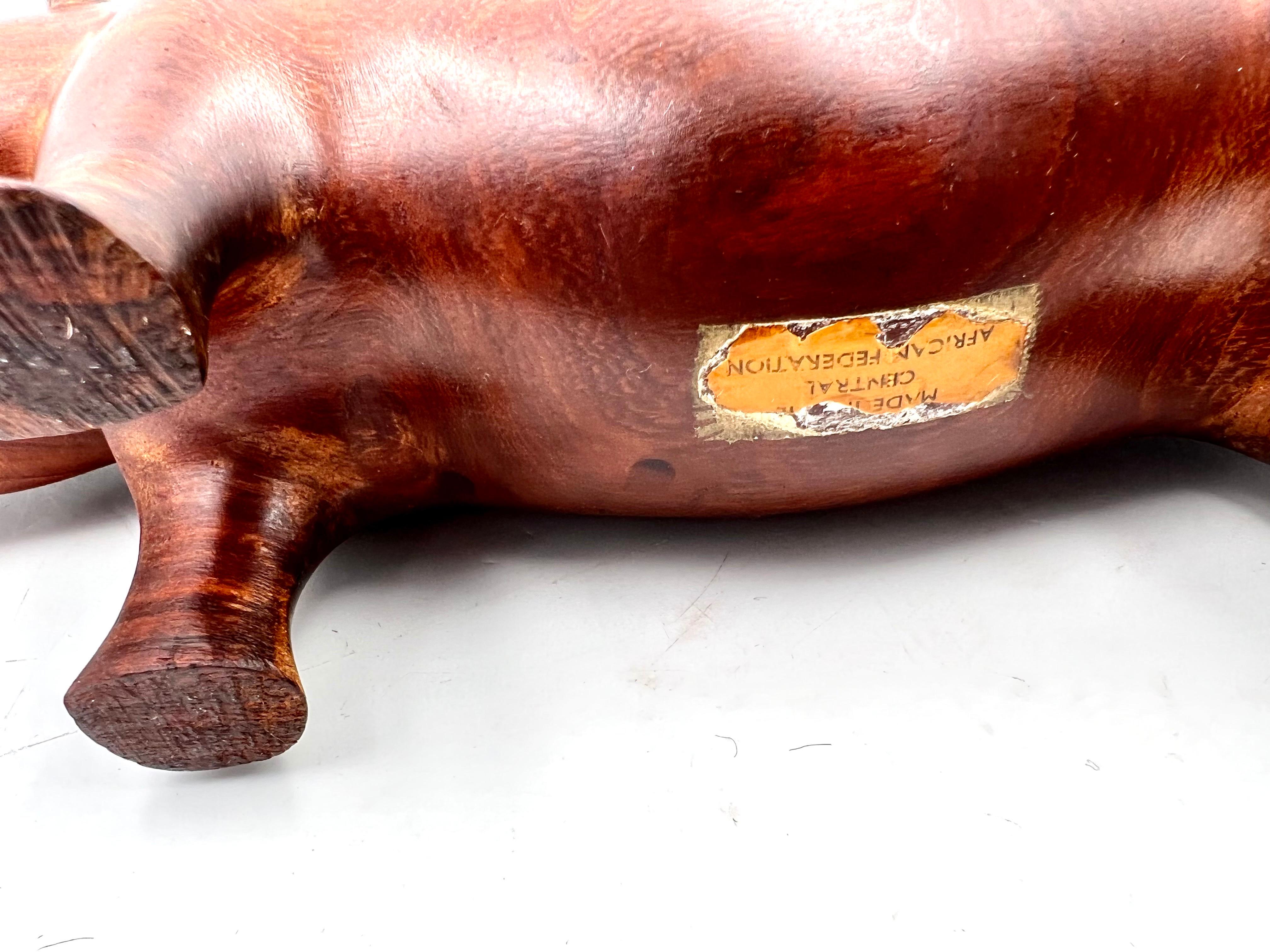 Central African Solid Hand Carved Rosewood African Hippo Sculpture with Bone Teeth For Sale