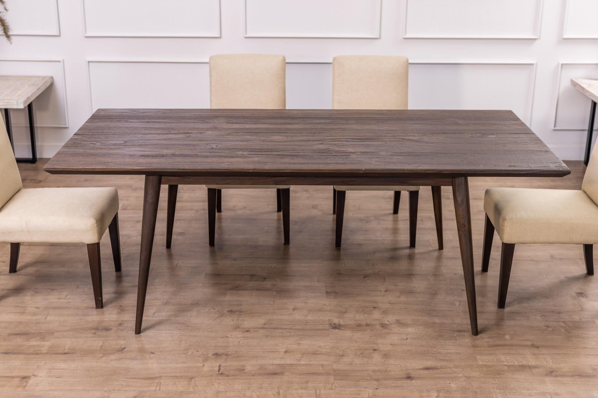 This table highlights classic mid-century styling to create a truly unique piece. The hand-crafted wooden legs support the beautifully handmade natural hardwood top with a graceful overhang and chamfered detail. The modern vintage style makes this
